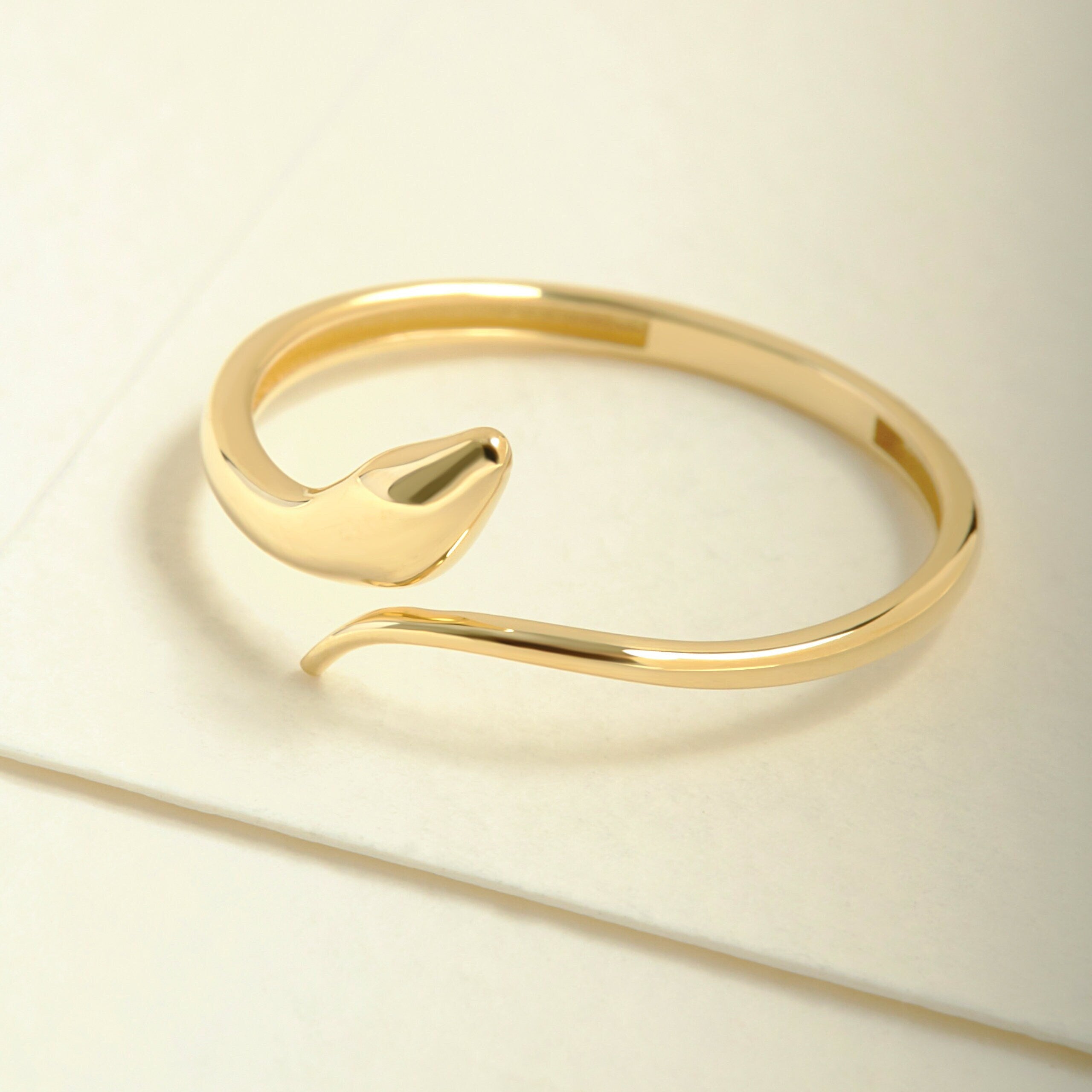 Here's the Stylish Snake Stacking Ring by Christo! Our 14K Solid Gold Spiral Open Ring is perfect Stackable and Daily Spiral Open Ring for Girls. This Minimalist Index Finger Cuff Ring is designed as Premium Chick Index Finger Ring