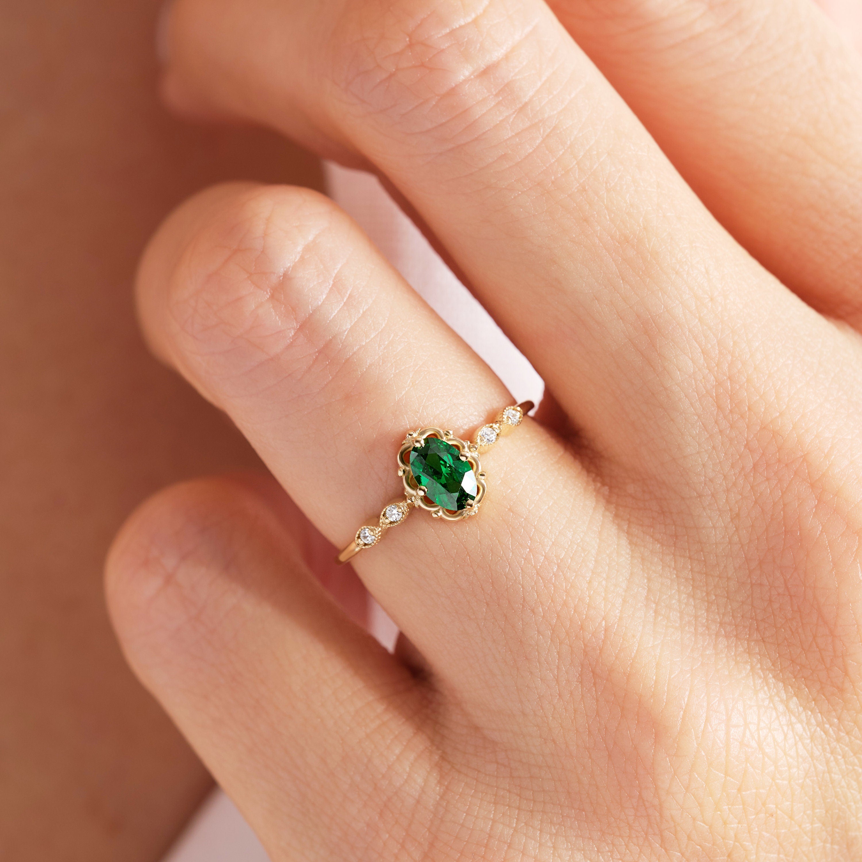 We combined oval emerald engagement ring with 14K solid gold small side diamond and created emerald diamond ring! This art deco emerald green wedding ring with tiny diamond can be customize with her birthstone! Are you looking for emerald ring gold and may birthstone ring. Here is emerald promise ring and oval emerald ring for yourself. Discover our thinking of you ring and 14K birthstone ring as a cristojuanna emerald gift.