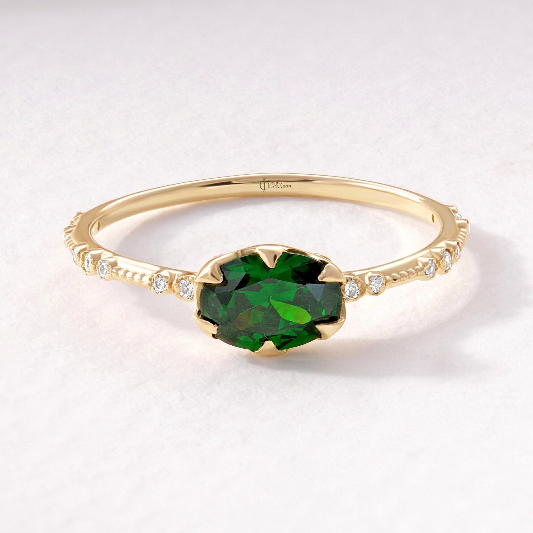 Oval Emerald Engagement Ring – 14K Solid Gold Side Diamond Band 💚✨
A timeless design for the elegant soul — this Oval Emerald Engagement Ring captures sophistication and sentiment. Handcrafted in solid 14K gold, it features a radiant 7x5 mm oval-cut emerald framed by sparkling side diamonds or moissanites, creating a graceful harmony of color and brilliance.