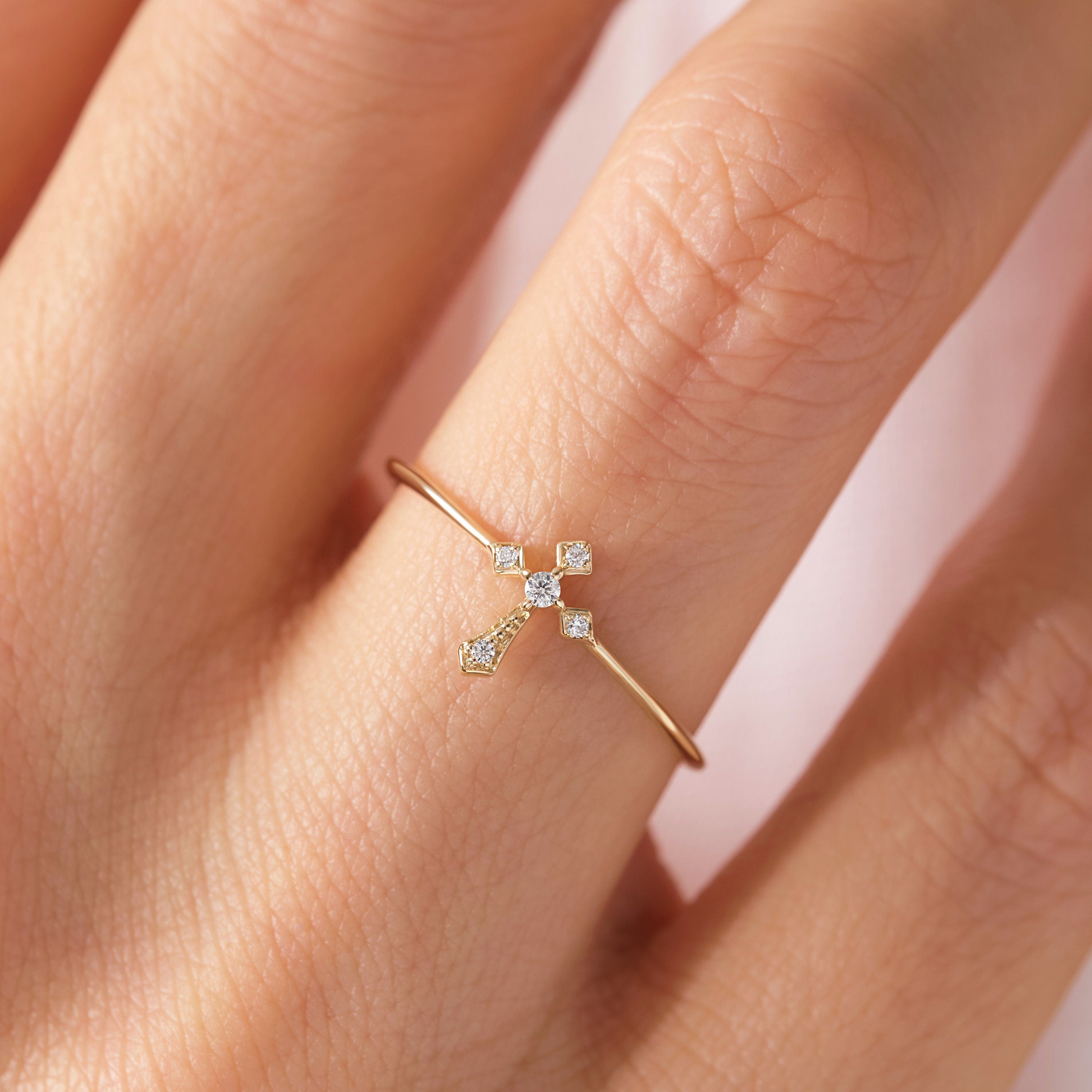 14K Solid Gold Cross Diamond Ring – Stackable Religious Rosary Band ✝️💎
Graceful and symbolic, this cross diamond ring blends faith and elegance in a sleek, minimalist design. Perfect for daily wear or stacking, it’s a meaningful piece that honors spirituality and timeless style. Whether you wear it as a Christian ring for women, a baptism gift, or a simple religious 10K ring, this piece will always carry deep significance.