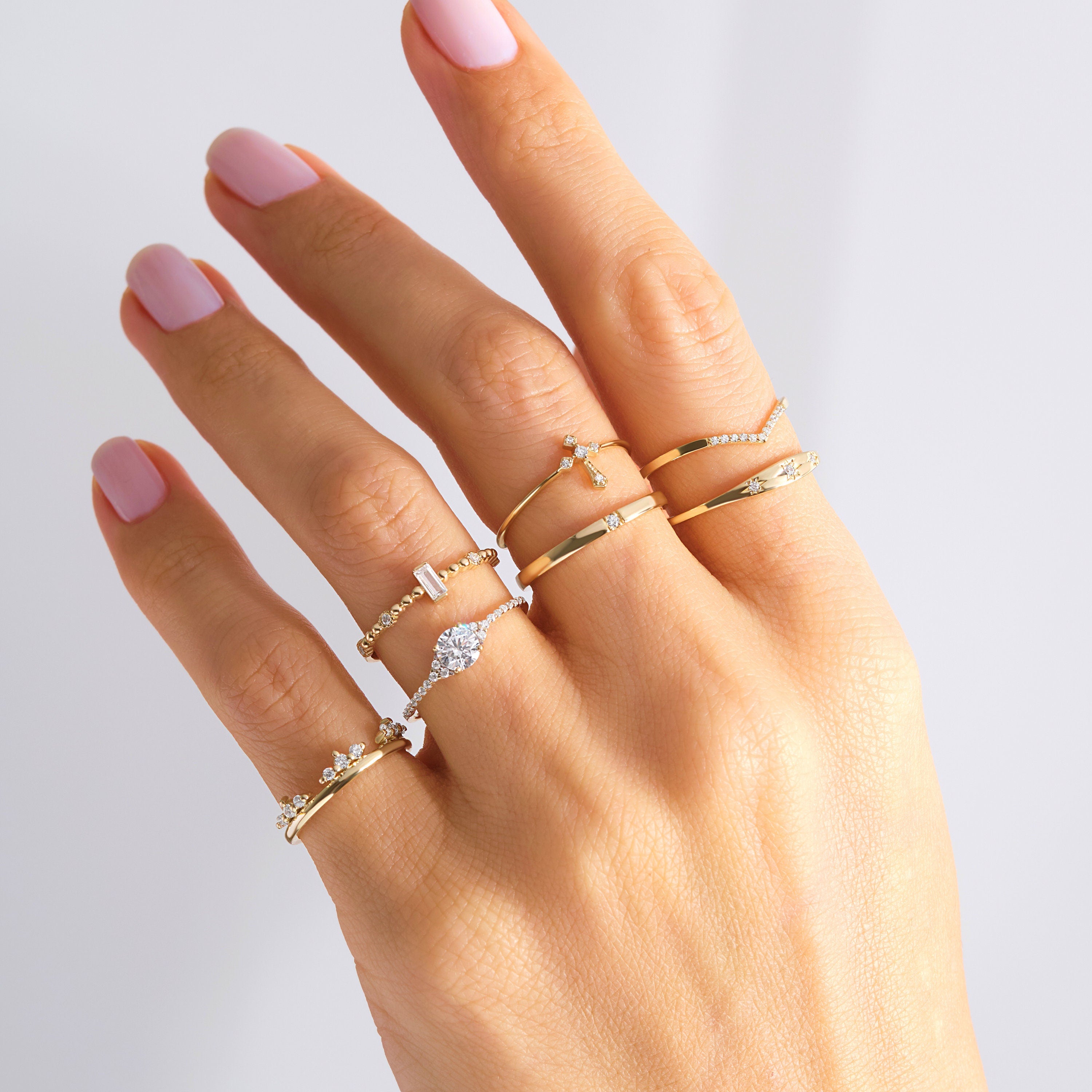 14K Solid Gold Cross Diamond Ring – Stackable Religious Rosary Band ✝️💎
Graceful and symbolic, this cross diamond ring blends faith and elegance in a sleek, minimalist design. Perfect for daily wear or stacking, it’s a meaningful piece that honors spirituality and timeless style. Whether you wear it as a Christian ring for women, a baptism gift, or a simple religious 10K ring, this piece will always carry deep significance.