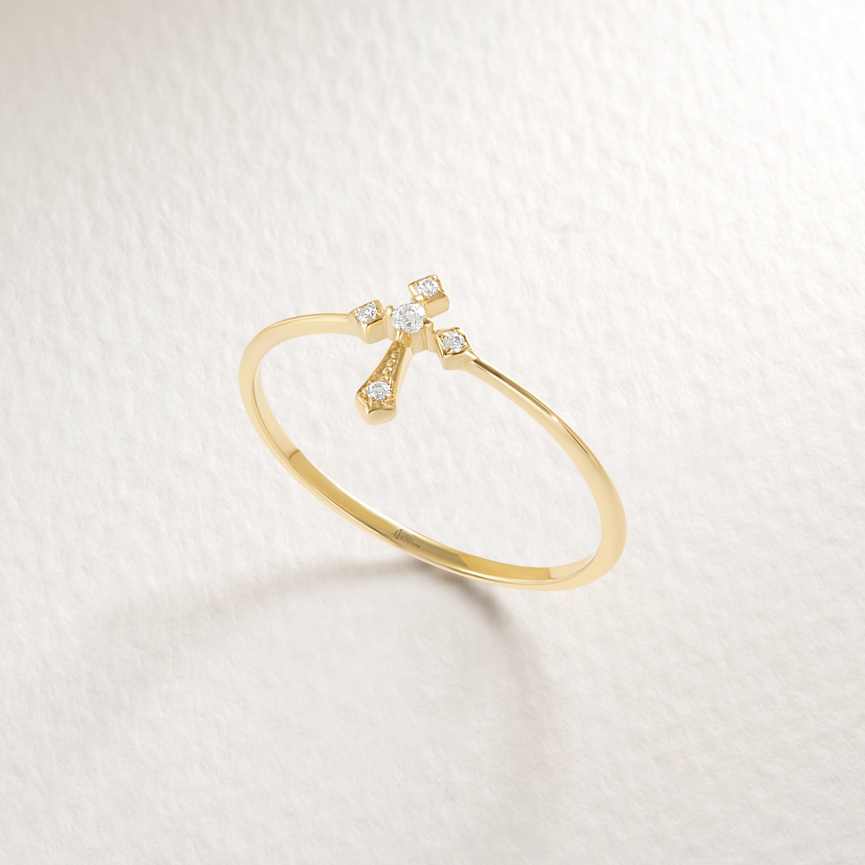 14K Solid Gold Cross Diamond Ring – Stackable Religious Rosary Band ✝️💎
Graceful and symbolic, this cross diamond ring blends faith and elegance in a sleek, minimalist design. Perfect for daily wear or stacking, it’s a meaningful piece that honors spirituality and timeless style. Whether you wear it as a Christian ring for women, a baptism gift, or a simple religious 10K ring, this piece will always carry deep significance.