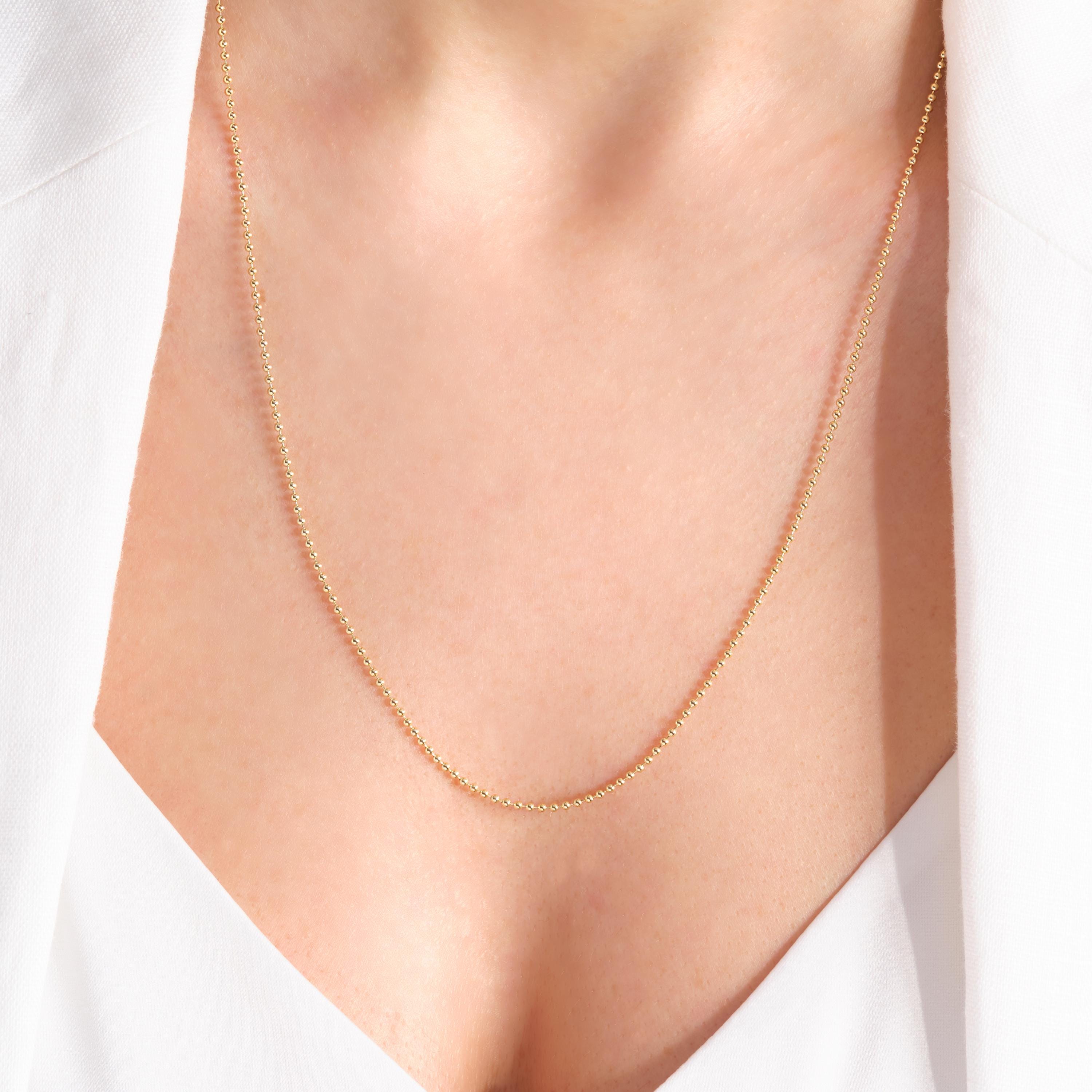 Bead Chain Necklace – 14K Solid Gold ✨💛
A timeless beaded chain designed for everyday elegance. This 1.5 mm solid gold bead necklace is perfect for layering with other chains or wearing alone for a minimalist, chic look.