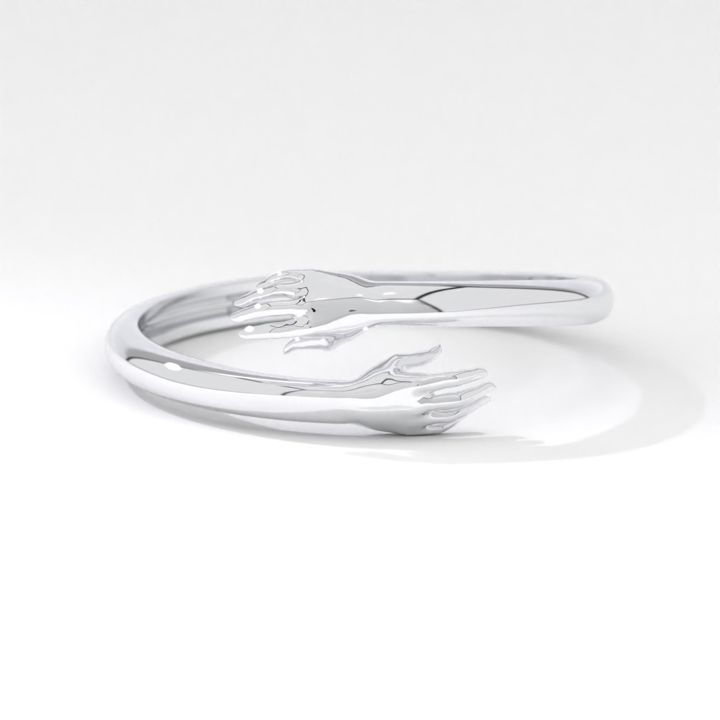 A gold ring that symbolizes a constant embrace for the one you gift it to. Available in various gold purities, it's an elegant and meaningful choice for any occasion.
