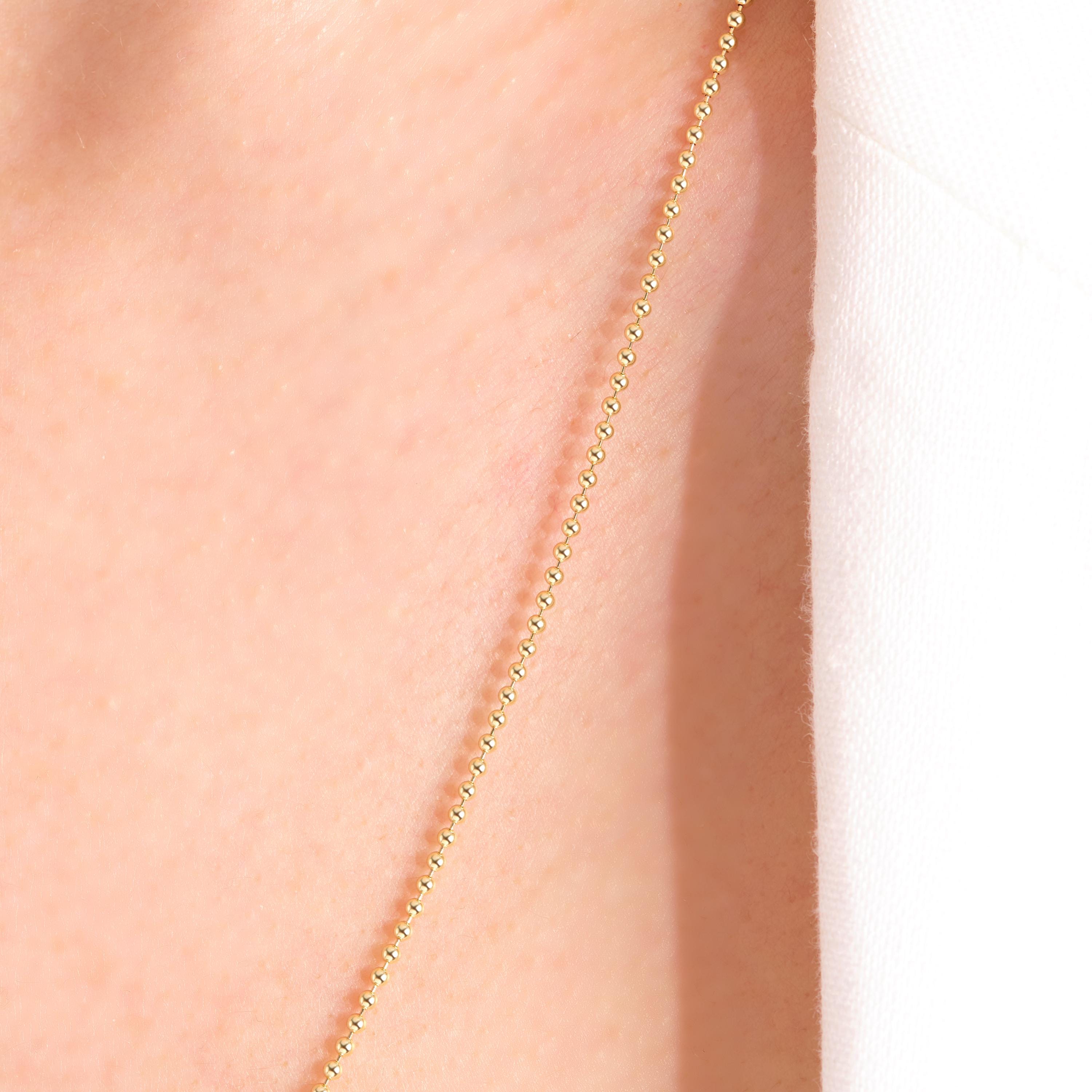 Bead Chain Necklace – 14K Solid Gold ✨💛
A timeless beaded chain designed for everyday elegance. This 1.5 mm solid gold bead necklace is perfect for layering with other chains or wearing alone for a minimalist, chic look.