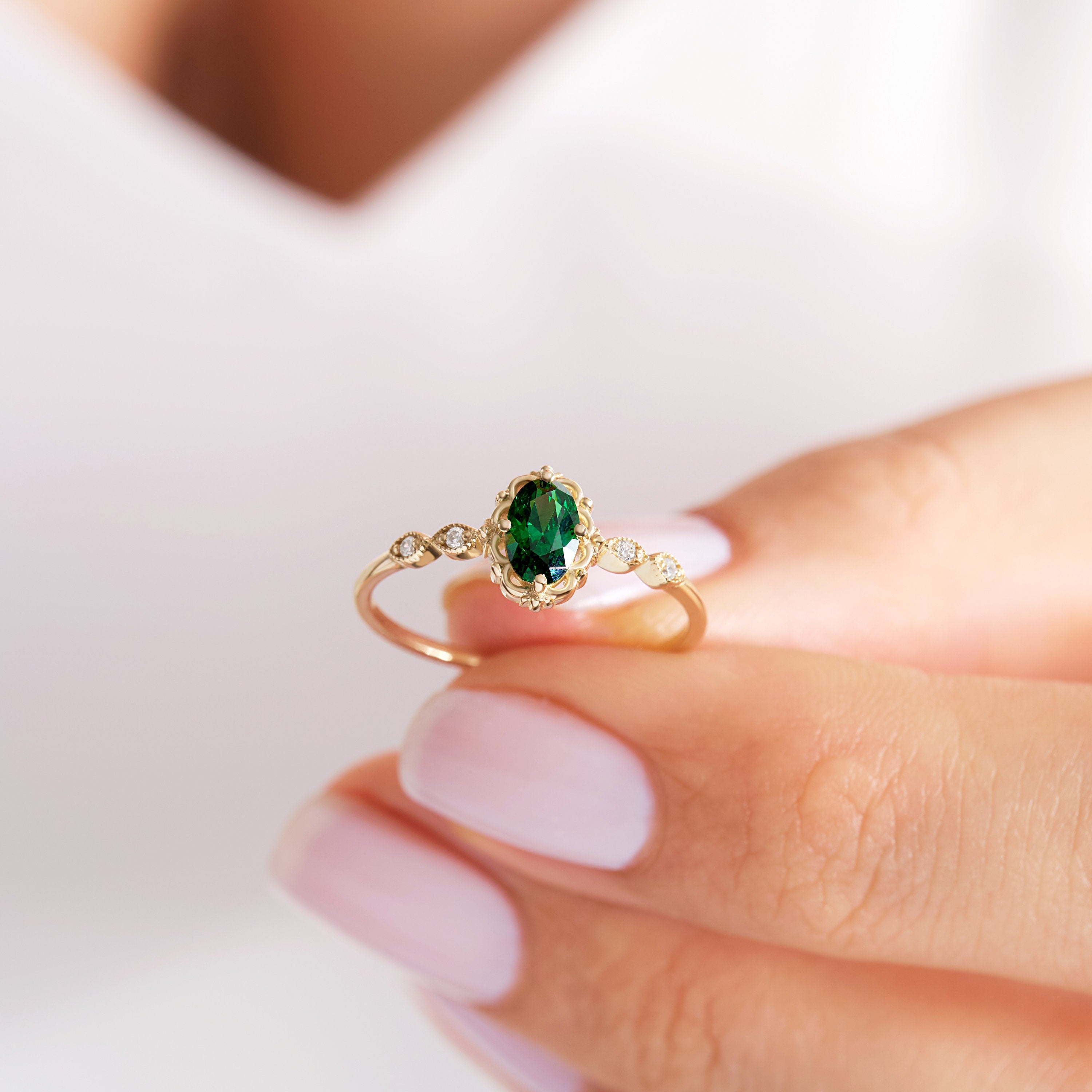We combined oval emerald engagement ring with 14K solid gold small side diamond and created emerald diamond ring! This art deco emerald green wedding ring with tiny diamond can be customize with her birthstone! Are you looking for emerald ring gold and may birthstone ring. Here is emerald promise ring and oval emerald ring for yourself. Discover our thinking of you ring and 14K birthstone ring as a cristojuanna emerald gift.