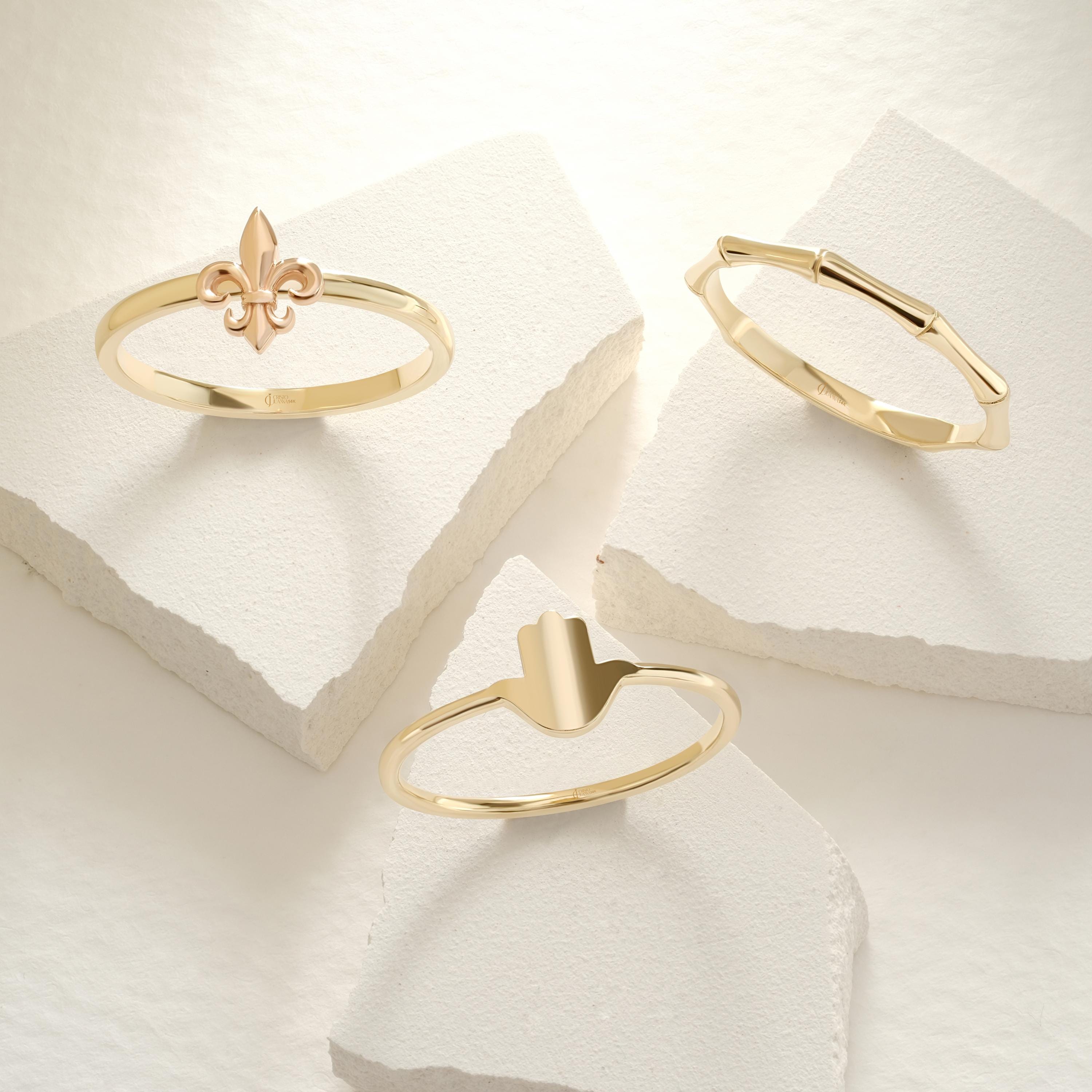 Hamsa Hand Ring – 10K / 14K / 18K Solid Gold 🧿✨
A meaningful Hamsa Hand design symbolizing luck, protection, and positive energy. This dainty gold band can be worn alone or stacked with other rings, making it a perfect everyday piece and a thoughtful gift.