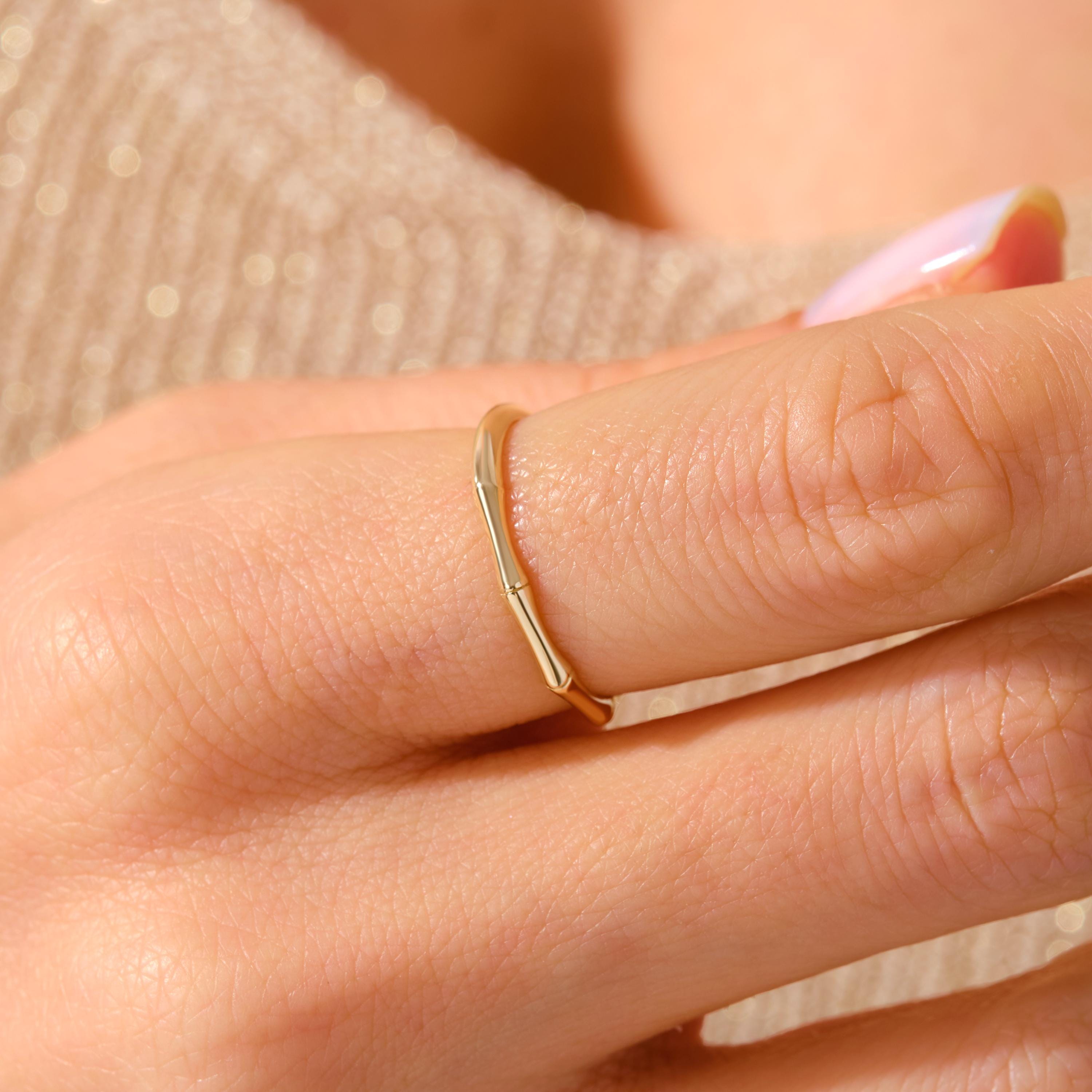 Elegant and nature-inspired bamboo ring gold 14K design, perfect for stacking or gifting. This gold stackable ring features a delicate texture, making it a stylish dainty boho ring 10K option. A true designer bamboo ring ideal as a summer jewelry gift or thoughtful ring gift for her. Choose a custom engraved ring for a unique touch. Our bamboo band ring 18K is a handcraft ring gold piece made with care. A meaningful personalized present for her as a birthday or her promise ring.