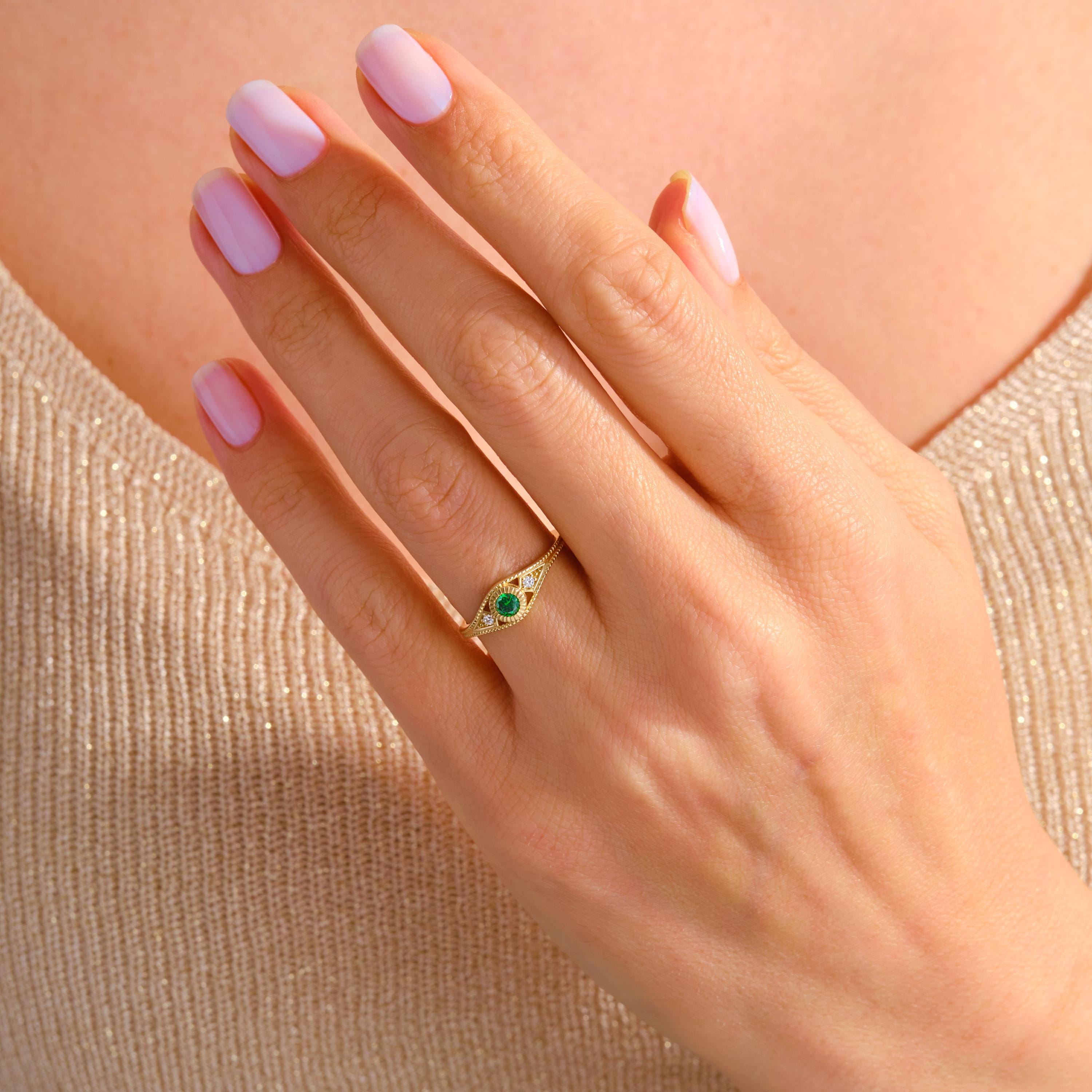 Timeless in form and refined in detail, this emerald wedding ring is elevated by side diamond rings and a sculptural split shank ring 14k silhouette. Designed as a personalized present with birthstone artdeco inspiration, it bridges elegance and emotion. From emerald engagement to vintage braided band, every element speaks intention.