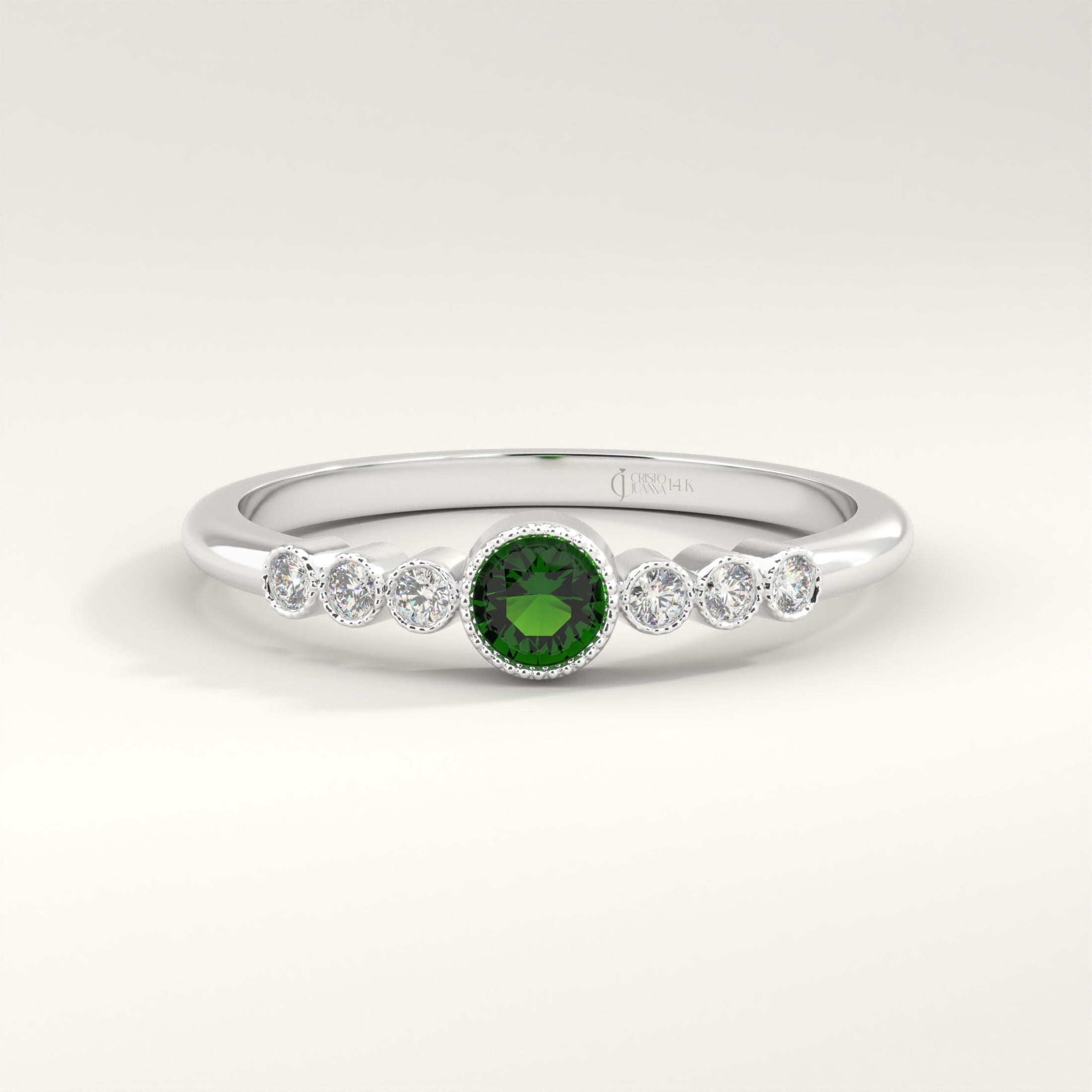 Celebrate life's milestones with this mini birthstone 14K ring — a dainty emerald ring crafted for meaningful moments. Featuring green gemstone rings and side diamond rings, it radiates timeless elegance. Perfect as an art deco gift summer piece, a promise solid gold token, or a custom birth month treasure.