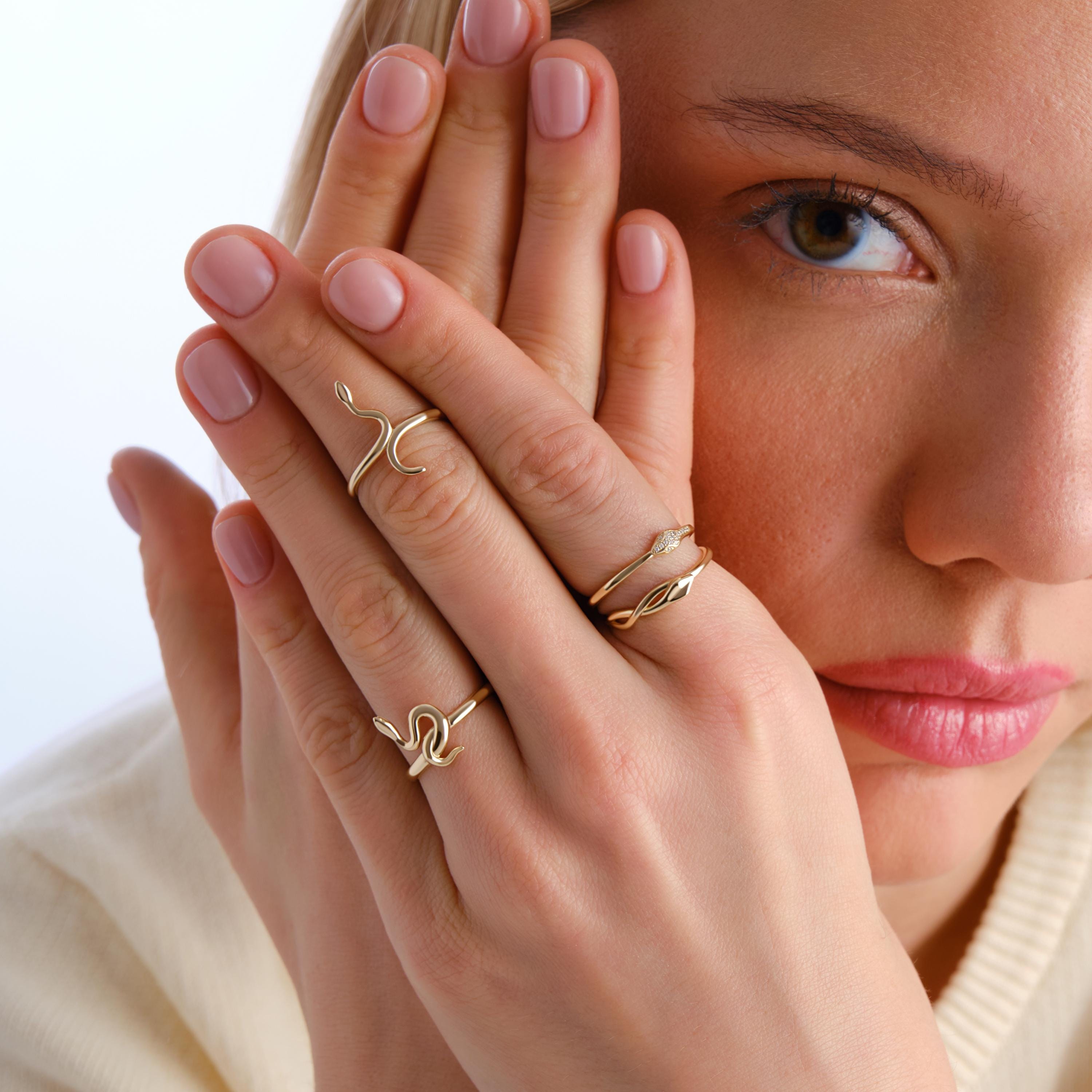 π 14K Gold Snake Ring with Diamond β Serpent Moissanite Gothic Band
Bold and symbolic, this dainty snake ring coils elegantly with shimmering stones across the head. A striking piece for lovers of gothic style, mythical symbolism, or unique minimalist jewelry.