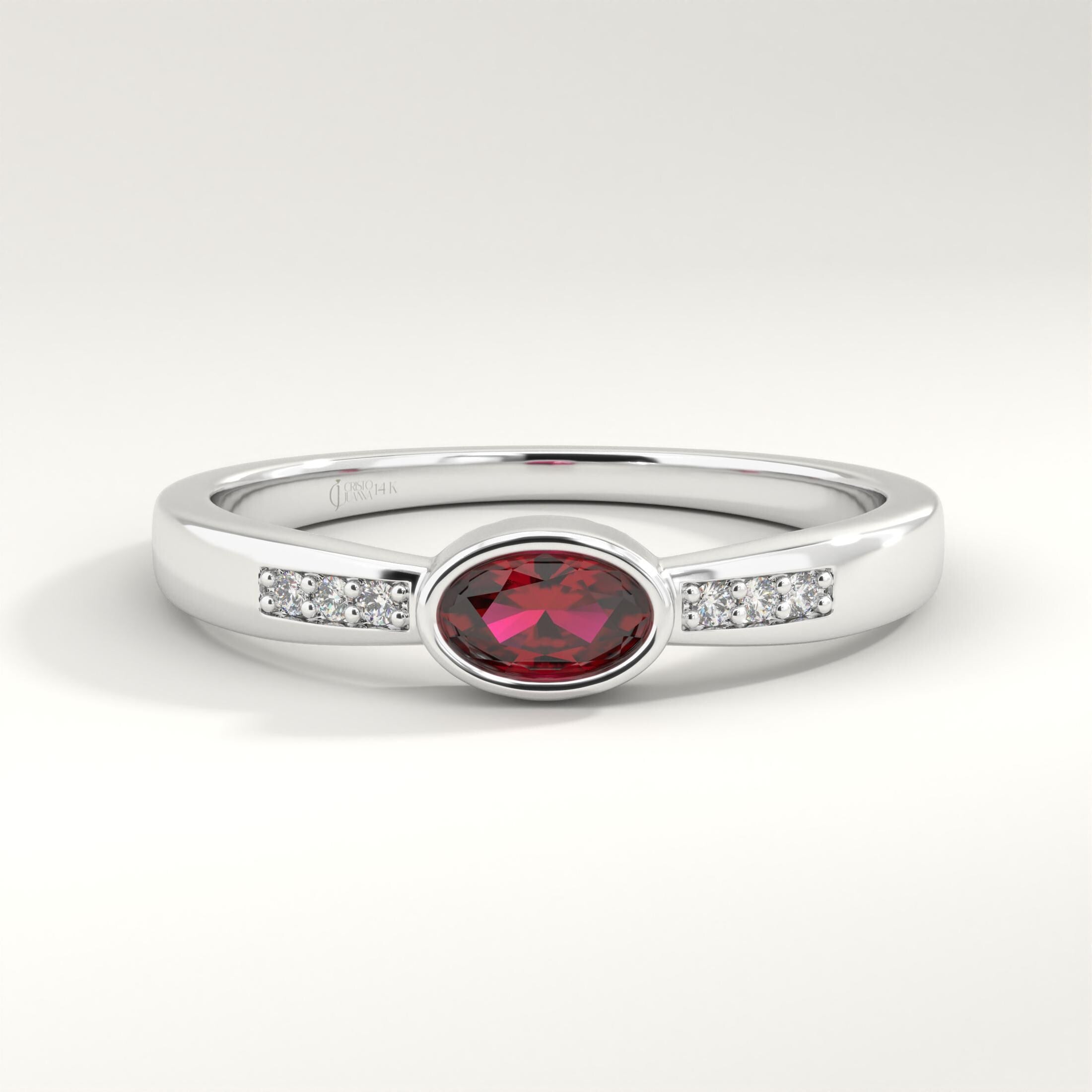 Ruby Engagement Ring with Side Diamond Band – 10K/14K/18K Solid Gold ✨💎
A stunning symbol of love, this bezel-set ruby ring features a deep red oval ruby accented by sparkling side diamonds. Perfect as a July birthstone ring, engagement ring, or anniversary gift, it blends timeless beauty with modern elegance.