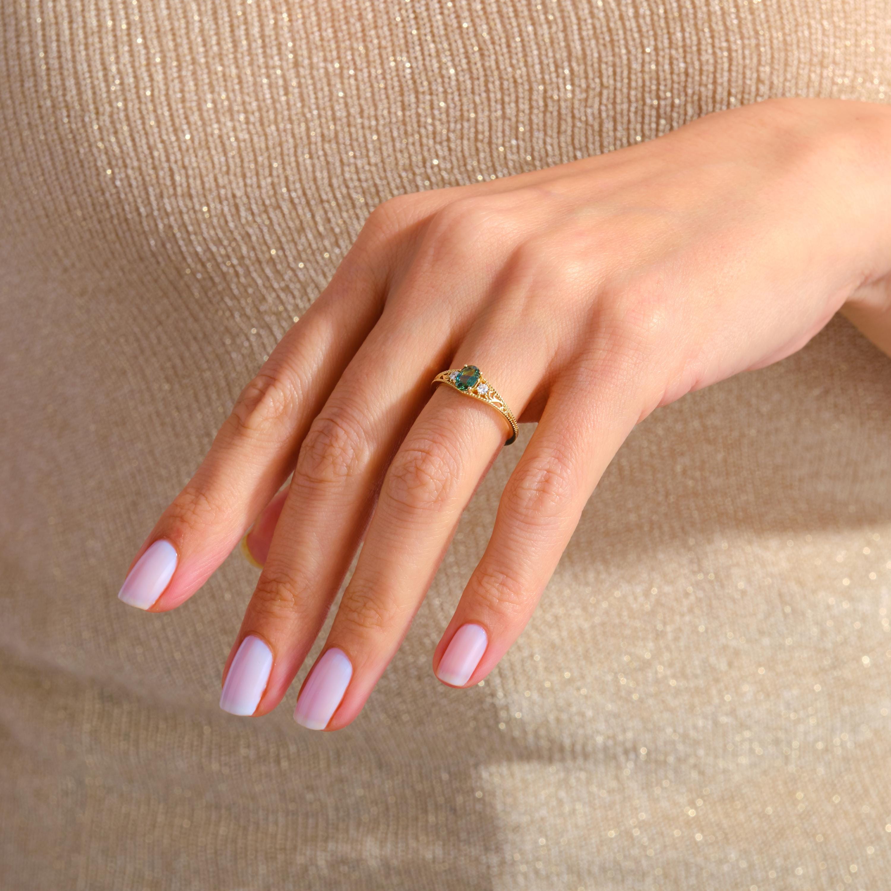Natural Green Sapphire Ring – 10K / 14K / 18K Solid Gold 💚💎
A timeless engagement and wedding ring featuring a genuine green sapphire accented with sparkling side diamonds. Its elegant vintage style makes it a perfect choice for women who love unique and meaningful jewelry.