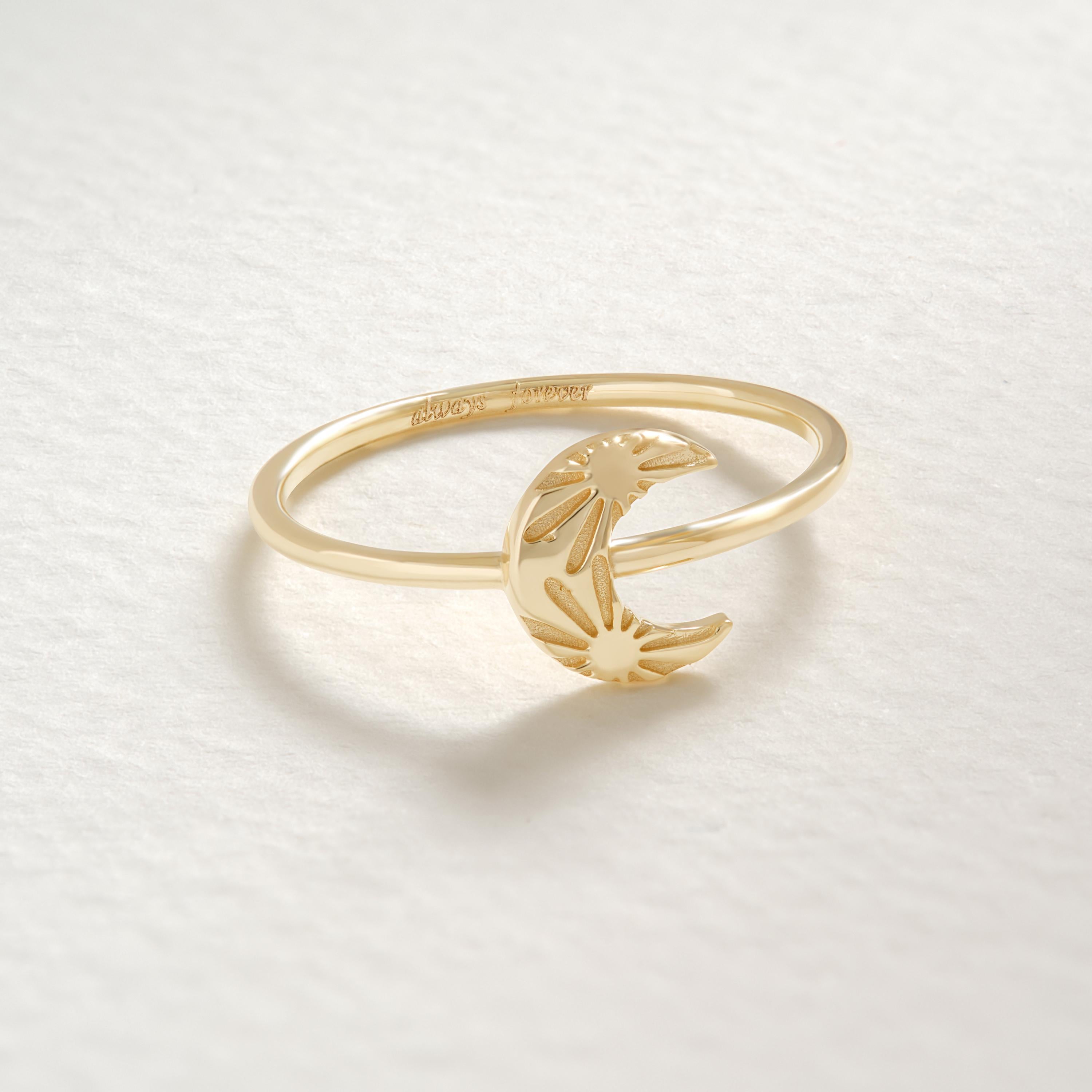 Crescent Moon Ring – 14K Solid Gold 🌙☀️
This delicate crescent moon ring features a moon and sun texture design, symbolizing balance, harmony, and the connection between day and night. Its minimalist style makes it perfect for everyday wear, stacking with other rings, or gifting to someone special who loves celestial jewelry.
The slim gold band is comfortable, timeless, and available in yellow, white, or rose gold — making it a versatile piece for any jewelry collection.