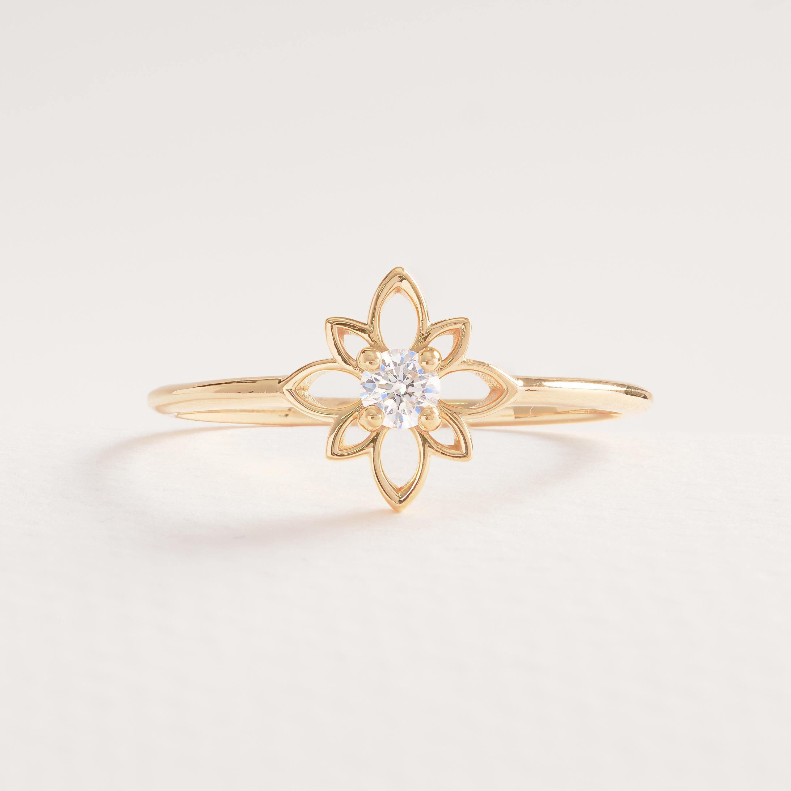 🌼 Diamond Open Daisy Ring | 14K Solid Gold Dainty Floral Stackable Band
Inspired by vintage elegance and the soft beauty of nature, this Diamond Open Daisy Ring features a delicate floral silhouette with a sparkling round stone at its center. Handcrafted in solid gold, this slim and graceful band is designed for effortless everyday wear and easy stacking. Its open daisy motif brings a light, boho charm while maintaining a timeless and feminine appeal.