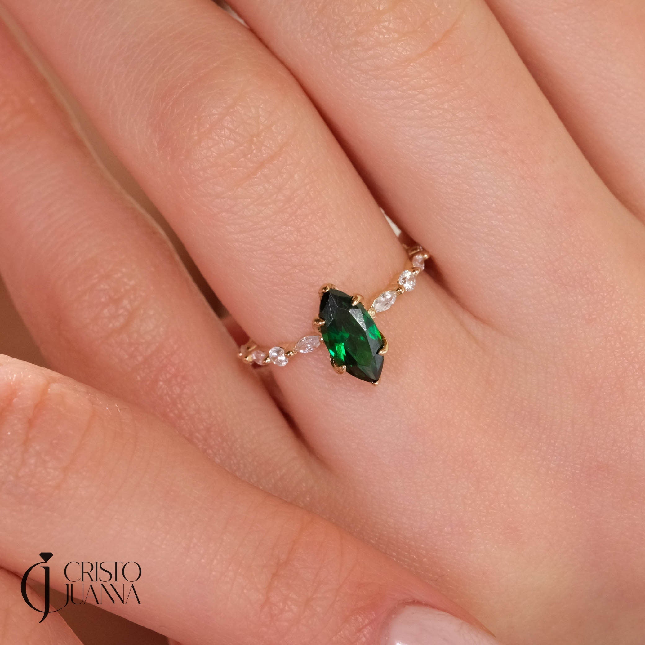 💚 Marquise Emerald Engagement Ring – 14K Solid Gold Side Diamond Band 💍

Make her heart sparkle with this marquise-cut emerald engagement ring, featuring a vivid green gemstone at its center and dazzling round-cut side diamonds for extra brilliance. This piece combines timeless elegance with a touch of modern artistry — perfect for engagements, anniversaries, or meaningful gifts.