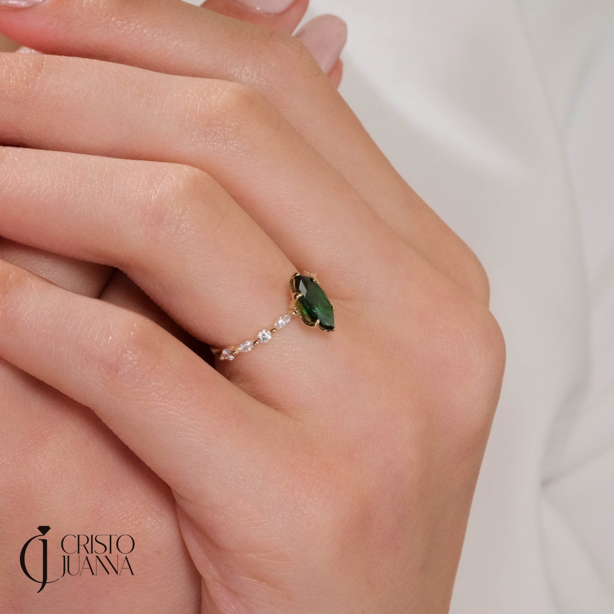💚 Marquise Emerald Engagement Ring – 14K Solid Gold Side Diamond Band 💍

Make her heart sparkle with this marquise-cut emerald engagement ring, featuring a vivid green gemstone at its center and dazzling round-cut side diamonds for extra brilliance. This piece combines timeless elegance with a touch of modern artistry — perfect for engagements, anniversaries, or meaningful gifts.