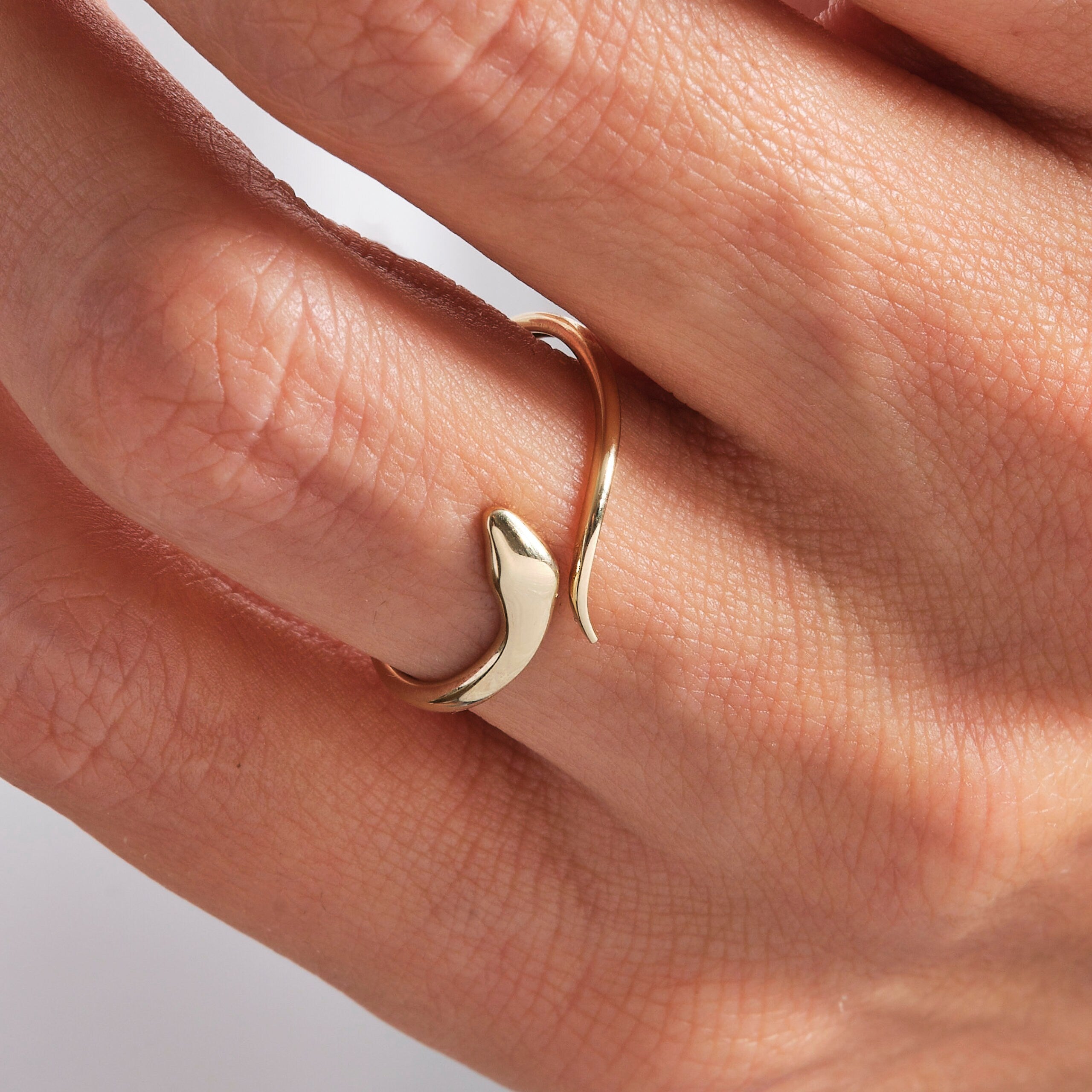 Here's the stylish snake stacking ring 14K solid gold spiral open ring by Christo! Our minimalist index finger cuff ring is perfect stackable wrapped adjustable band everyday ring for women. If you re looking for snake ring 14K gold and cuff ring