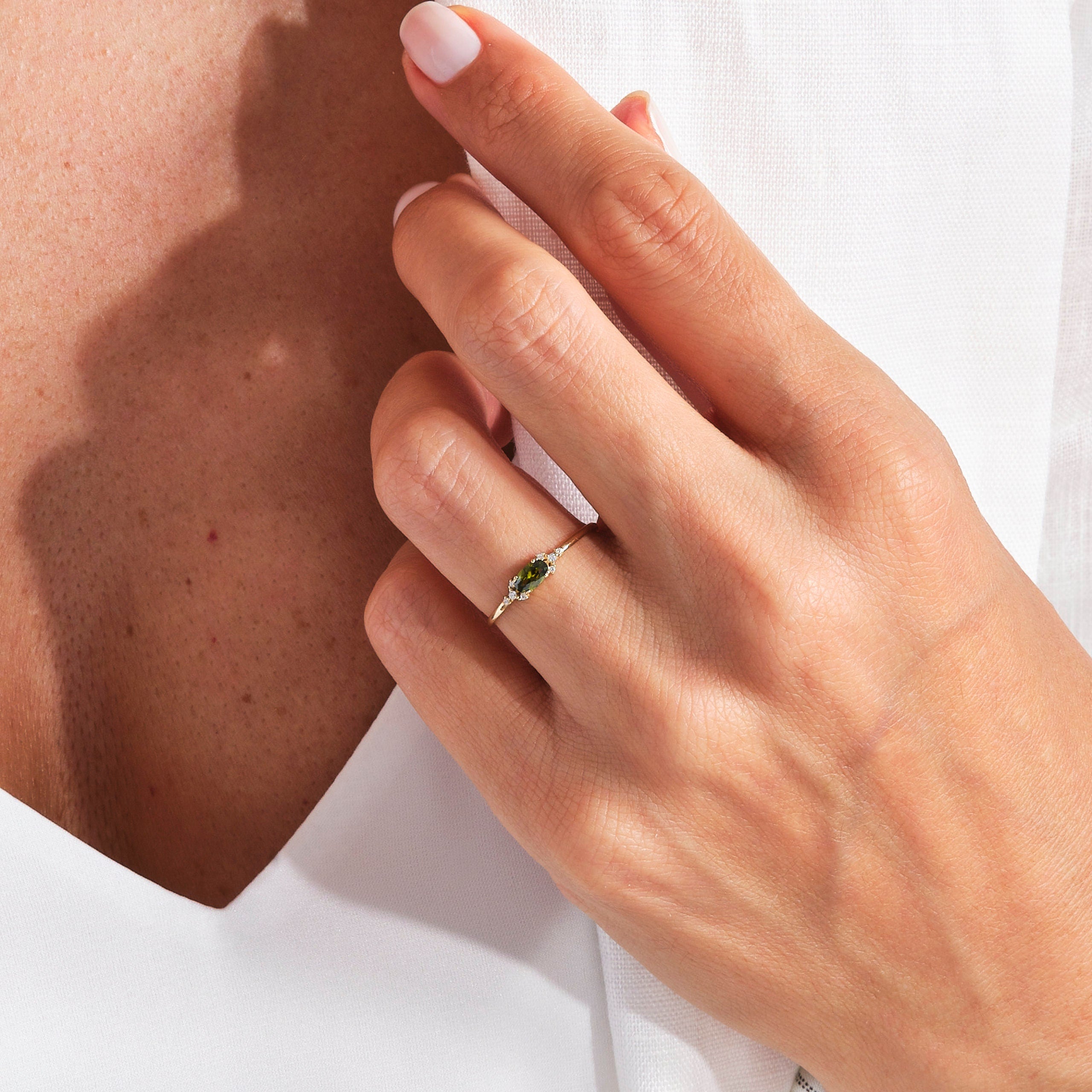 14K Gold Peridot Diamond Ring – Dainty Oval Birthstone Stacking Band 💚✨
Celebrate elegance and meaning with this handcrafted gold peridot ring, featuring a vibrant natural oval peridot and sparkling diamond or moissanite accents. Designed to be worn solo or as part of a dainty stacking ring set, this gemstone band radiates warmth, light, and timeless charm.