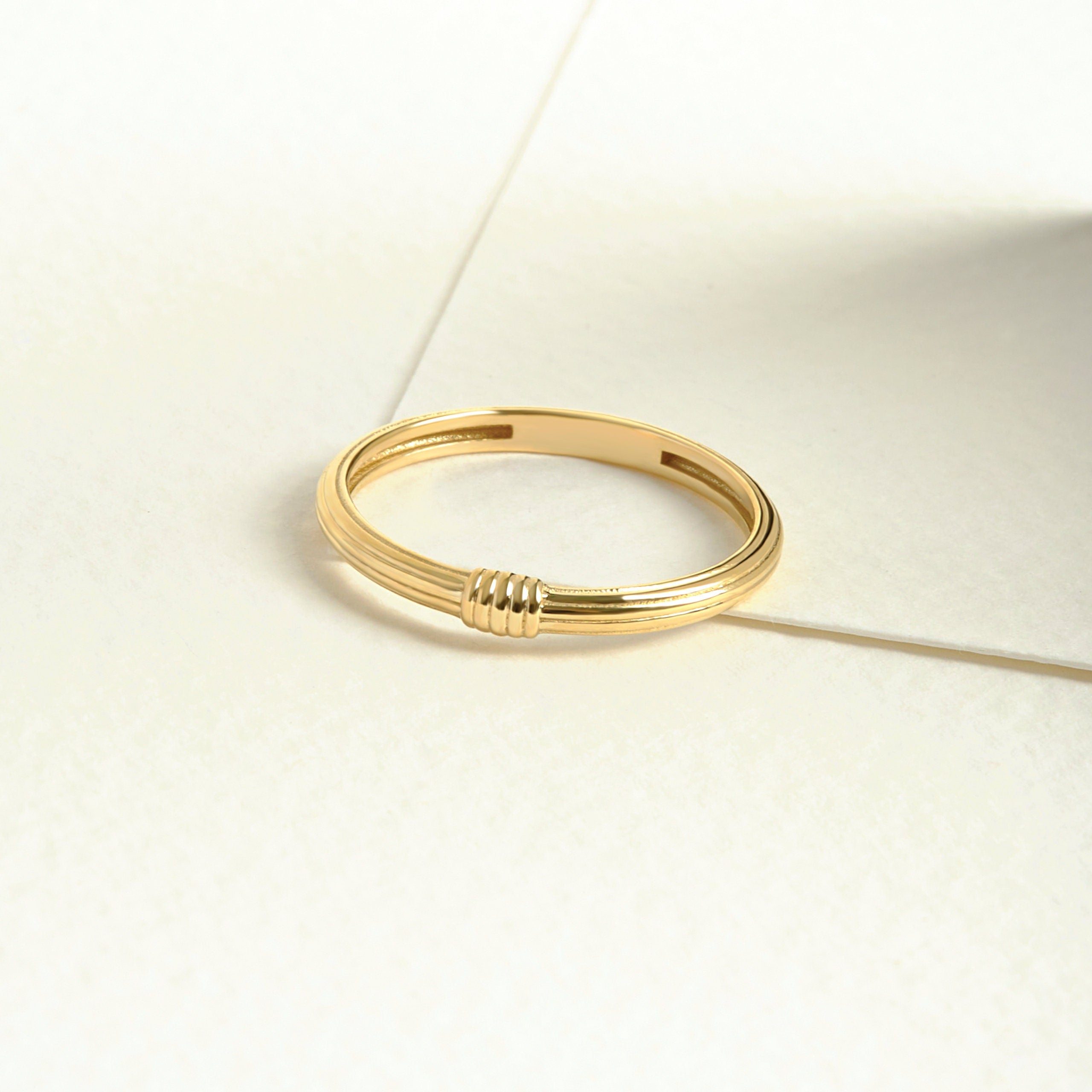 Double Knot Stackable Ring – 14K Solid Gold 💛✨
A timeless double knot ring symbolizing love, unity, and everlasting connection. Crafted in solid gold, its bold yet elegant design makes it perfect for everyday wear, stacking, or gifting to someone special — a best friend, mother, or soulmate. 💍