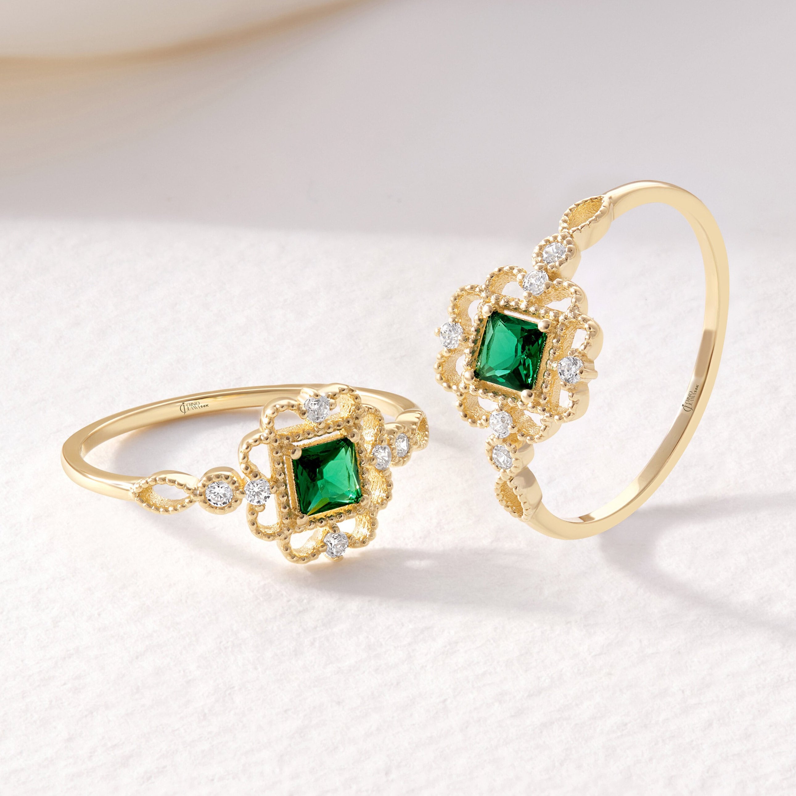Princess Cut Emerald Engagement Ring – 10K / 14K / 18K Solid Gold 💚✨
A vibrant princess-cut emerald set in a delicate band accented with sparkling round diamonds. Its square silhouette and art deco charm make it a timeless engagement, promise, or birthstone ring. A perfect gift for emerald lovers and vintage jewelry enthusiasts.
