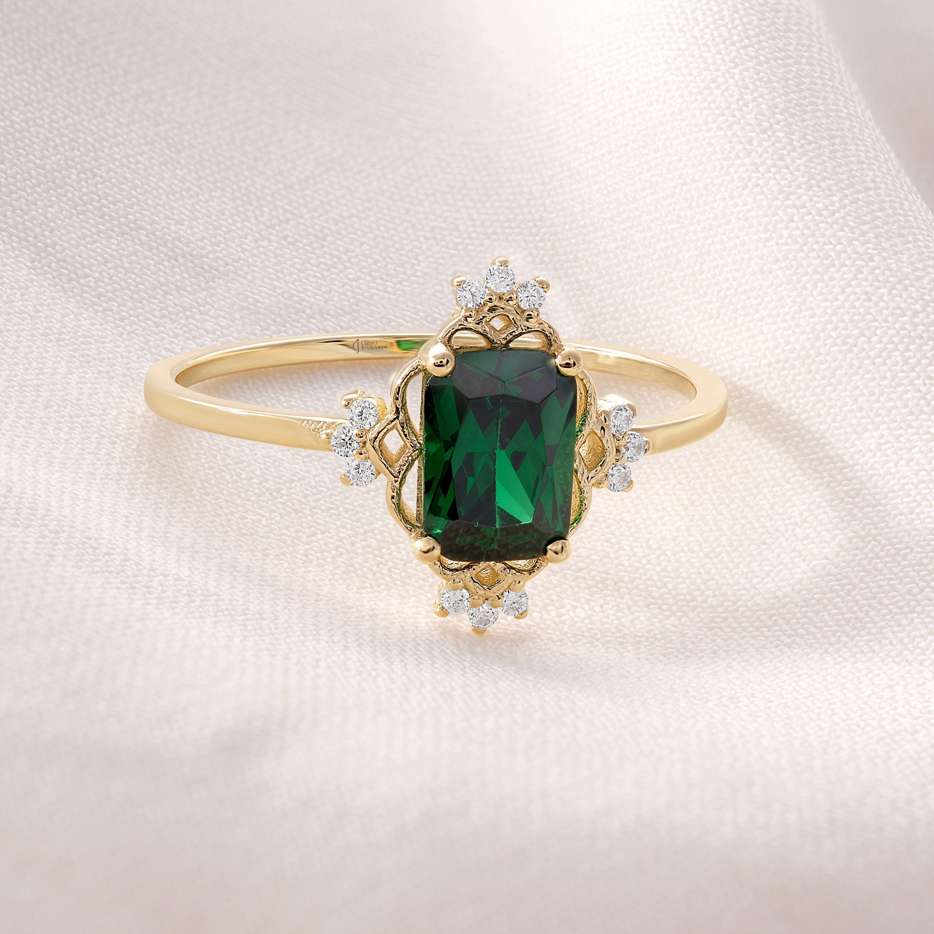 Emerald Cut Emerald Wedding Ring – 14K Solid Gold Band with Side Diamonds 💚✨
This Emerald Cut Wedding Ring celebrates timeless beauty and craftsmanship. Featuring a stunning 7x5 mm natural emerald surrounded by sparkling side diamonds, it radiates sophistication and meaning. The rectangular emerald symbolizes renewal and growth — a perfect piece for weddings, anniversaries, or milestone celebrations.