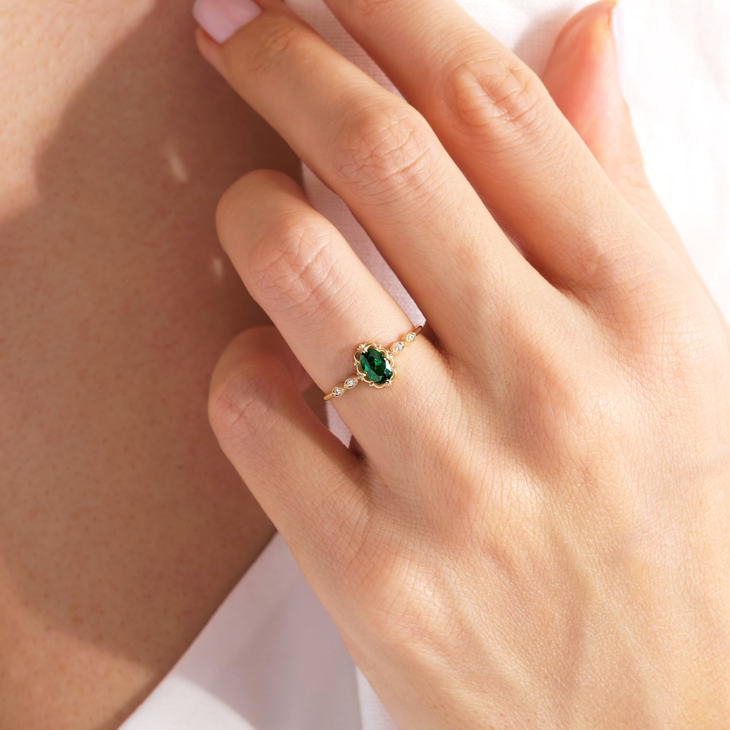 We combined oval emerald engagement ring with 14K solid gold small side diamond and created emerald diamond ring! This art deco emerald green wedding ring with tiny diamond can be customize with her birthstone! Are you looking for emerald ring gold and may birthstone ring. Here is emerald promise ring and oval emerald ring for yourself. Discover our thinking of you ring and 14K birthstone ring as a cristojuanna emerald gift.