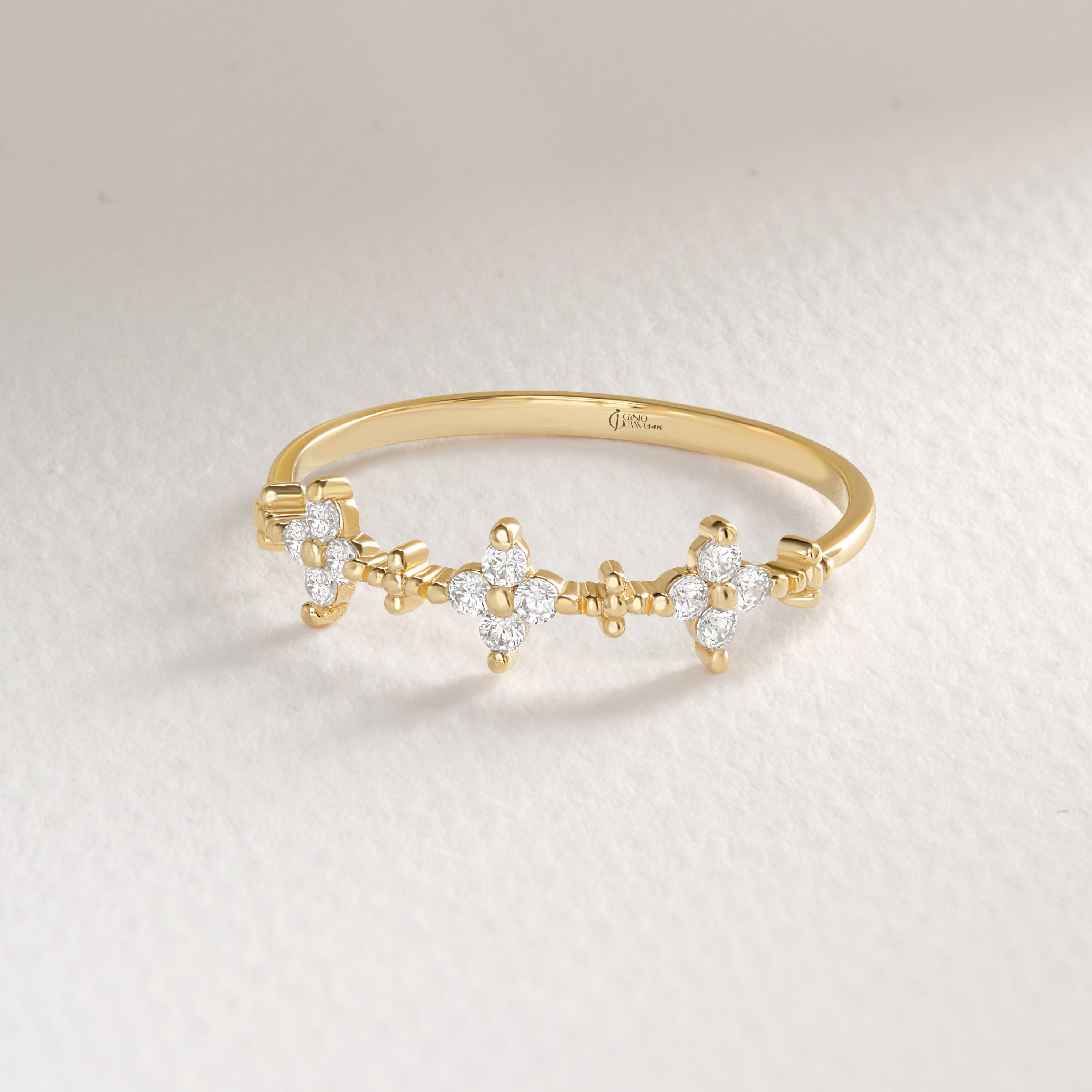 🌸 Diamond Clover Wedding Ring – 14K Solid Gold 🌸

Elegant and meaningful, the Diamond Clover Wedding Ring brings a touch of minimalist sparkle and natural symbolism to your hand. Set with dazzling moissanite stones, this delicate band is perfect for wearing alone or stacking with other rings for everyday elegance or special occasions.