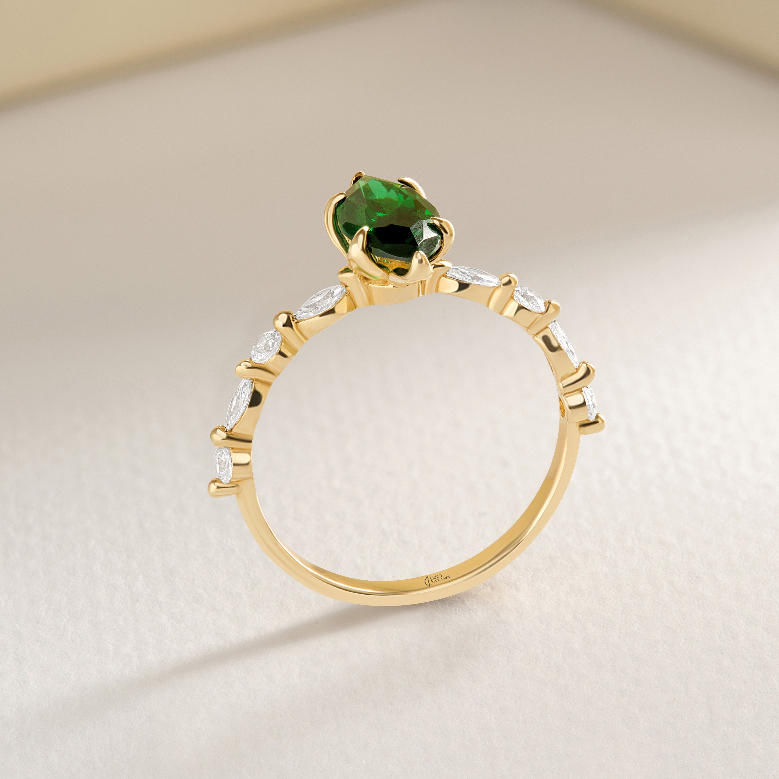 💚 Marquise Emerald Engagement Ring – 14K Solid Gold Side Diamond Band 💍

Make her heart sparkle with this marquise-cut emerald engagement ring, featuring a vivid green gemstone at its center and dazzling round-cut side diamonds for extra brilliance. This piece combines timeless elegance with a touch of modern artistry — perfect for engagements, anniversaries, or meaningful gifts.