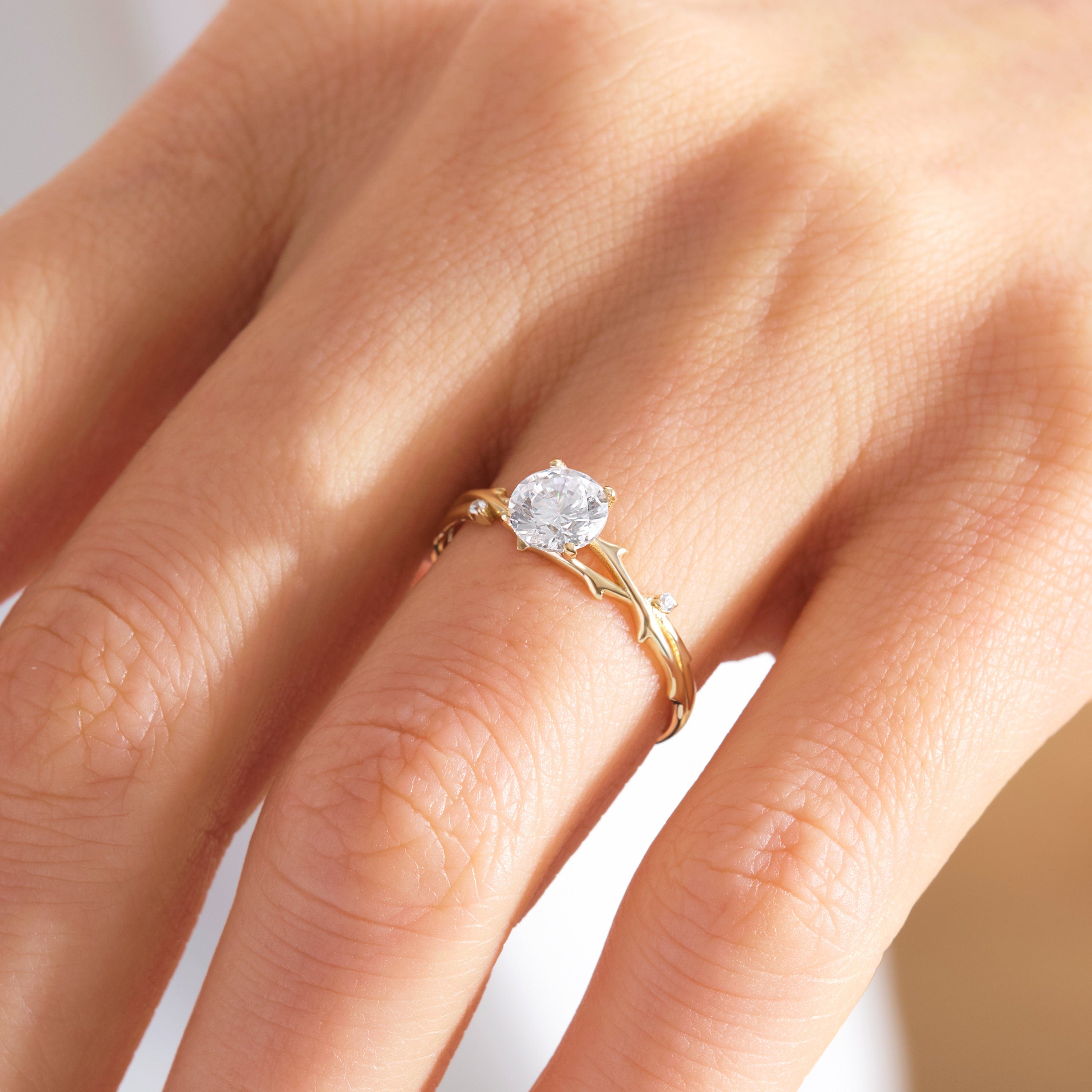 Diamond Twig Engagement Ring 14K Solid Gold – Nature Inspired Leaf & Branch Moissanite Wedding Band 🌿💍

Whimsical, romantic, and full of natural beauty — this Twig Engagement Ring captures the elegance of nature with its delicate branch design and sparkling stones. Perfect as a unique engagement ring, a symbolic wedding band, or a thoughtful gift for her.
