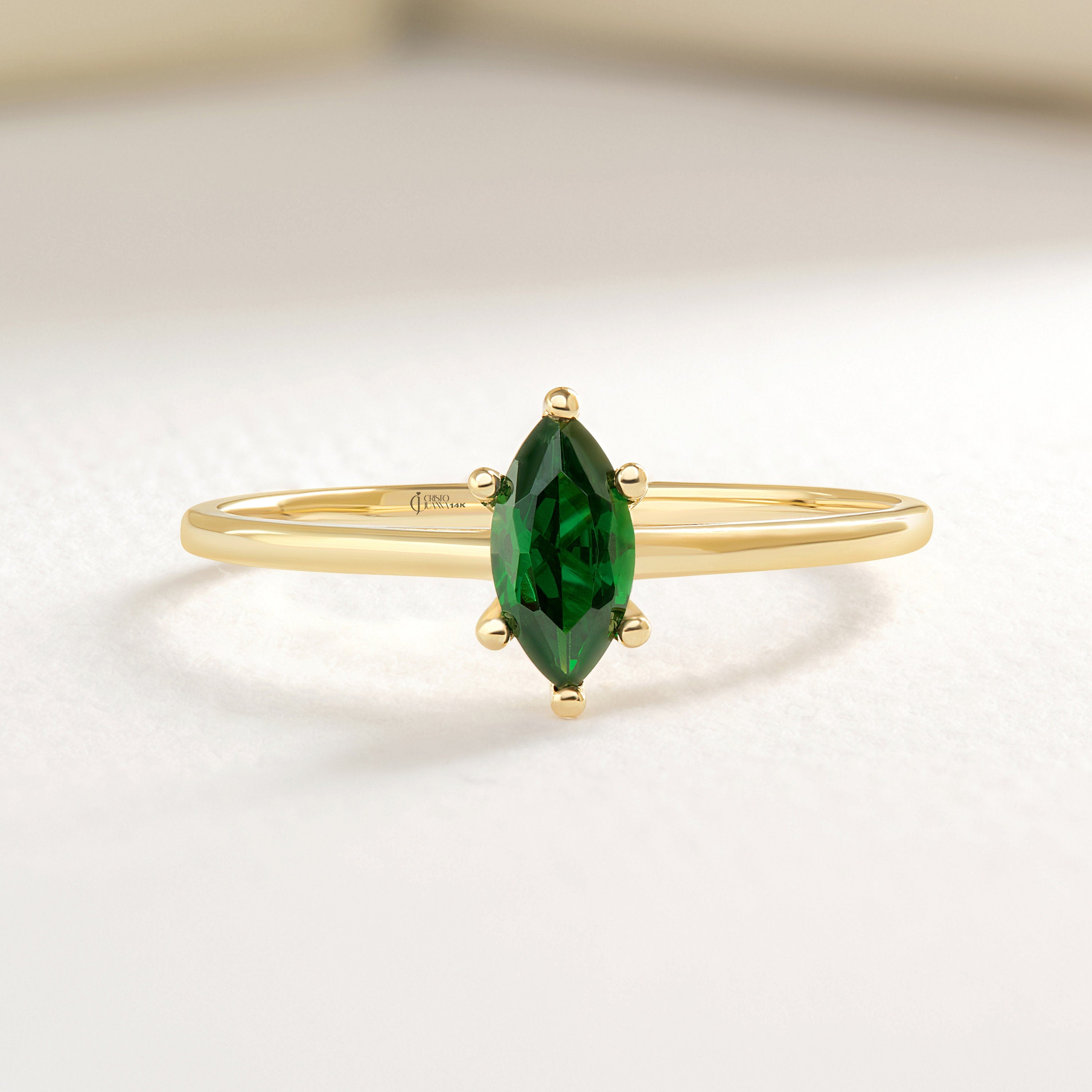 Here is our marquise cut emerald ring with 14K solid gold band for women! This solo birthstone ring for women and customize single stone ring will be perfect gift for her wedding or engagement ceremony.