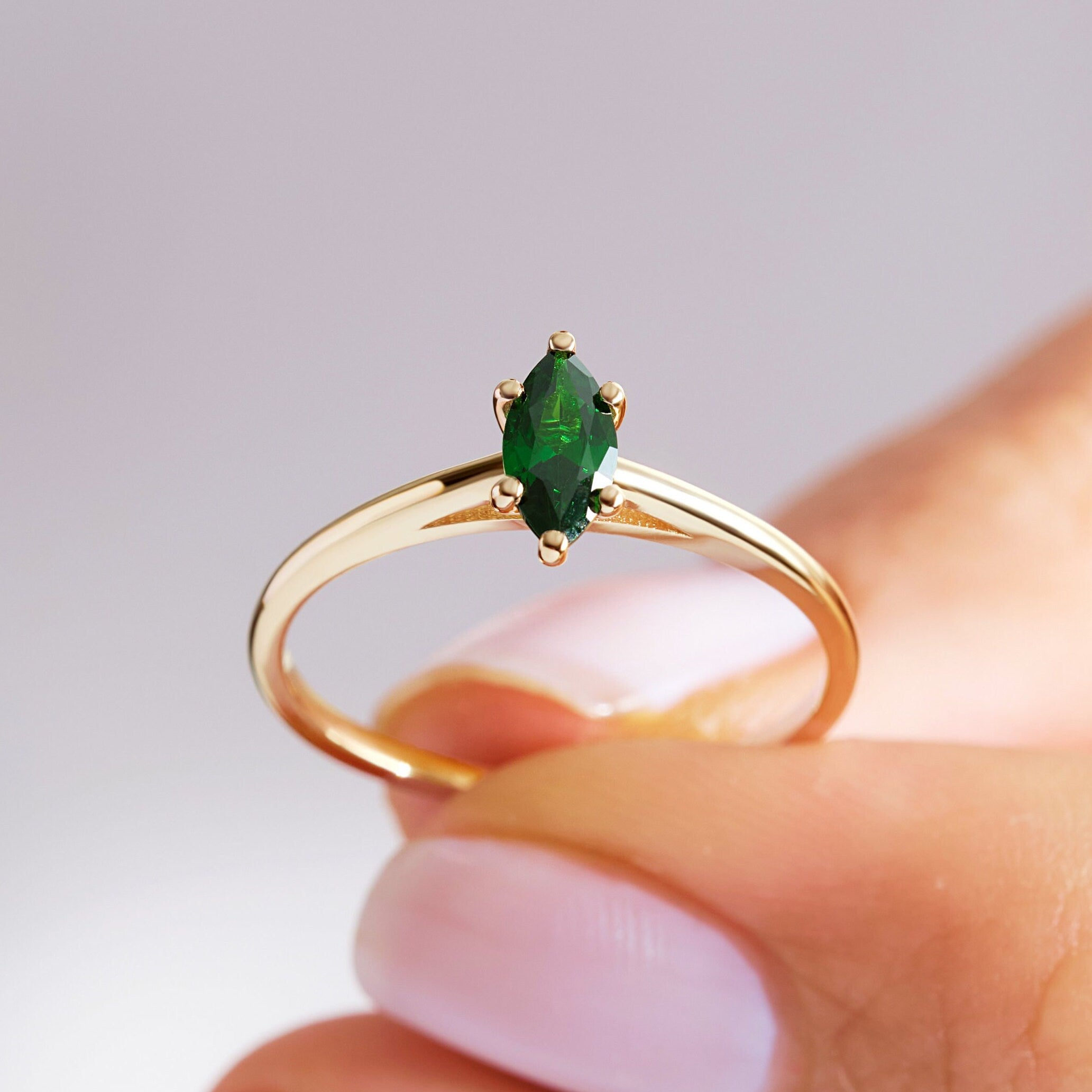 Here is our marquise cut emerald ring with 14K solid gold band for women! This solo birthstone ring for women and customize single stone ring will be perfect gift for her wedding or engagement ceremony.