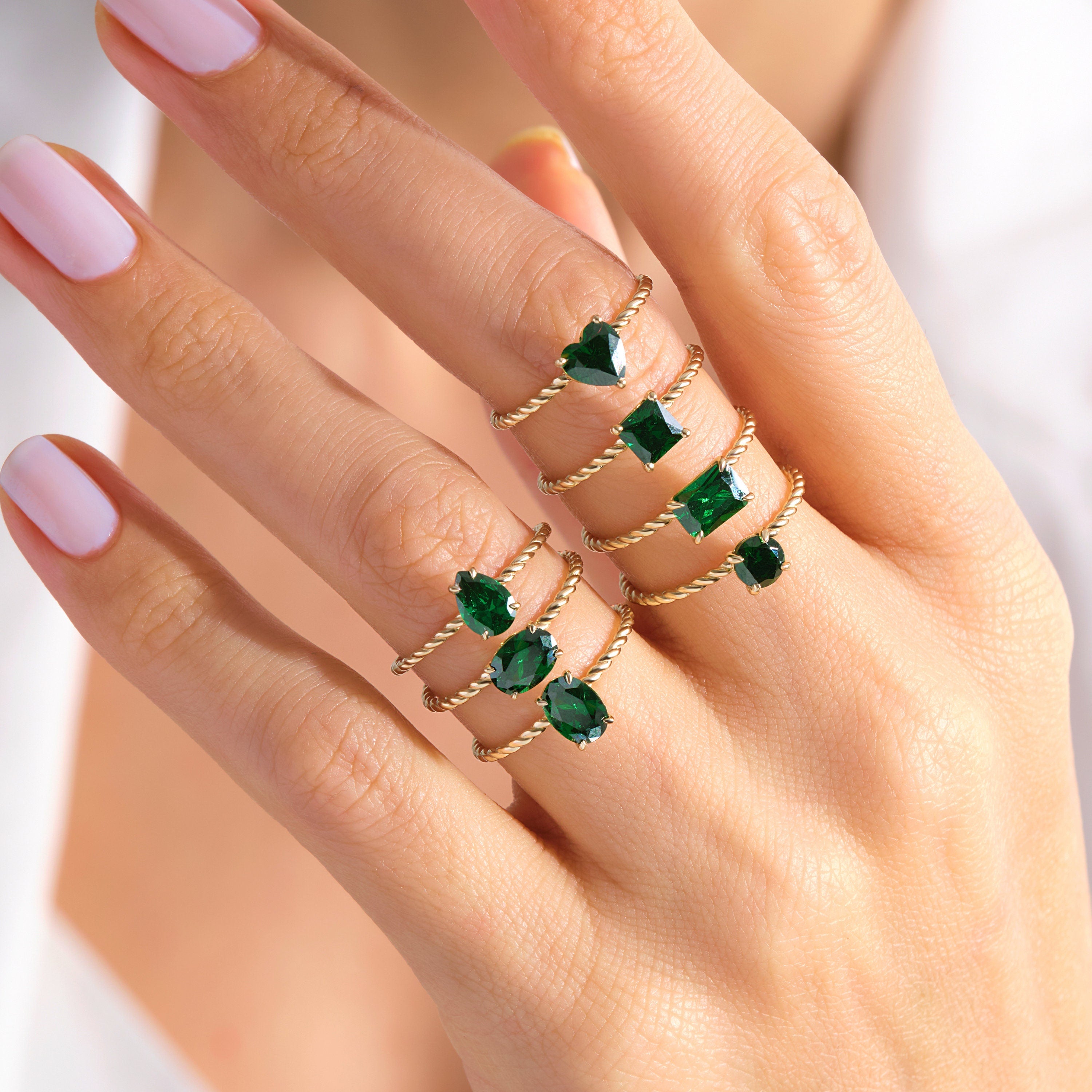 Emerald Cut Emerald Ring – 14K Solid Gold Twisted Rope Band 💚✨
This emerald cut emerald ring blends timeless sophistication with artisanal design. The deep green rectangular gemstone is beautifully framed by a twisted rope band, handcrafted in solid 14K gold for a touch of vintage luxury. Whether worn solo or stacked, it’s a graceful statement of renewal, elegance, and individuality — perfect as a birthstone, anniversary, or Christmas gift.