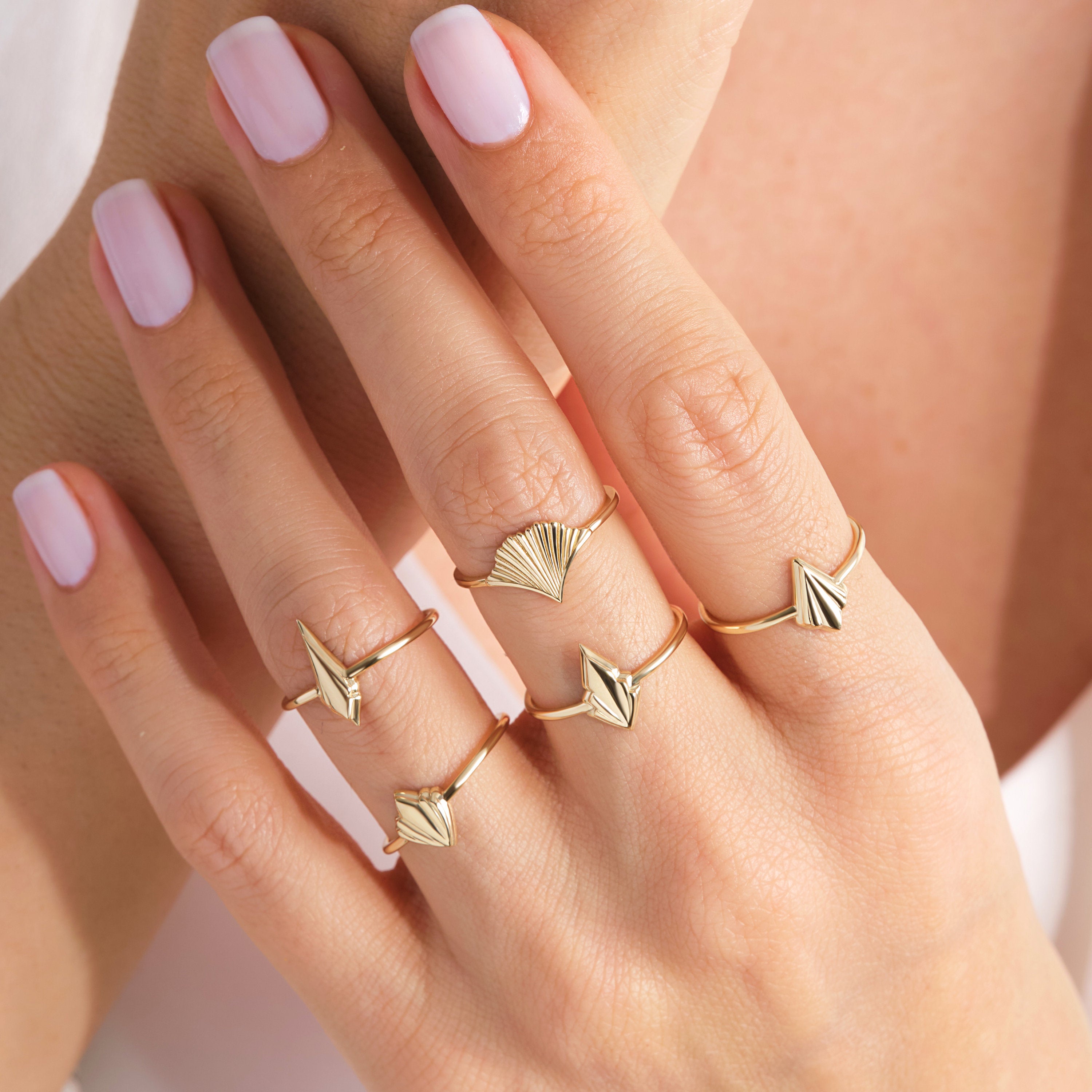 💍 Spike Kite Signet Ring — 14K Solid Gold Unique Designer Band

This modern spike–kite signet ring features a bold geometric silhouette crafted entirely from solid gold. Designed for women who love contemporary, sculptural jewelry, it’s perfect as a stackable ring, statement piece, or meaningful gift. Its sleek, polished finish brings a refined yet edgy touch to any collection.