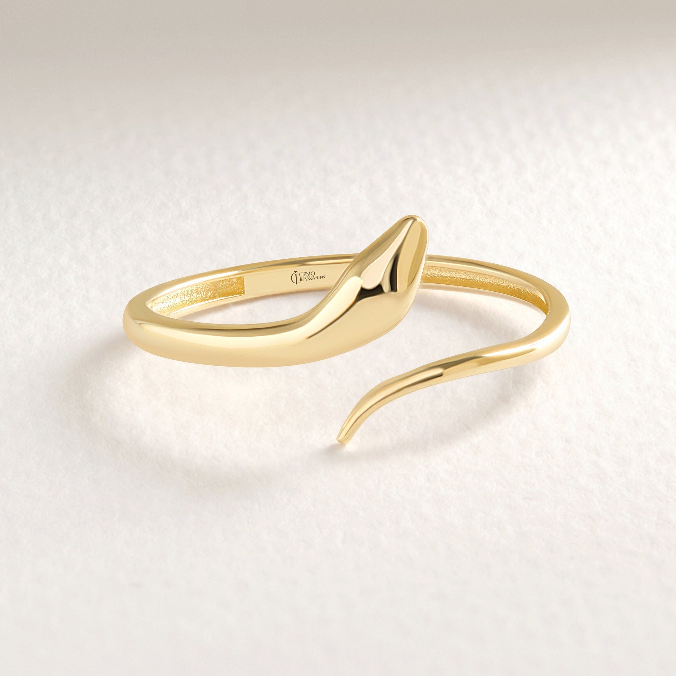 Here's the stylish snake stacking ring 14K solid gold spiral open ring by Christo! Our minimalist index finger cuff ring is perfect stackable wrapped adjustable band everyday ring for women. If you re looking for snake ring 14K gold and cuff ring