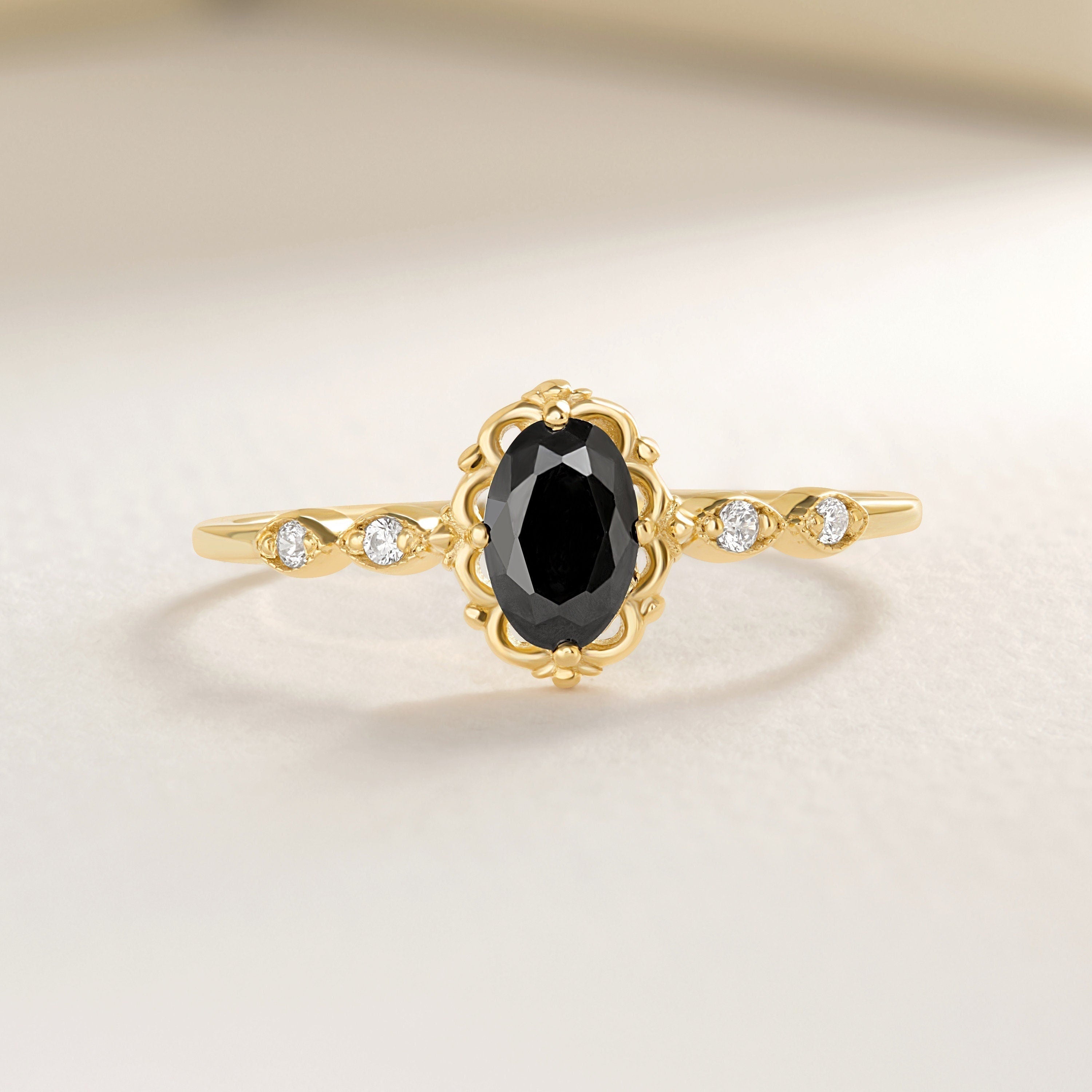 ChatGPT:

🖤 Onyx Diamond Engagement Ring – 14K Solid Gold Art Deco Vintage Design 💍

Elegant, bold, and timeless — this Onyx Diamond Engagement Ring brings together the mystique of deep black onyx with the sparkle of dazzling side stones. Designed with a refined Art Deco touch, it’s a perfect piece for brides who love classic beauty with a modern edge.