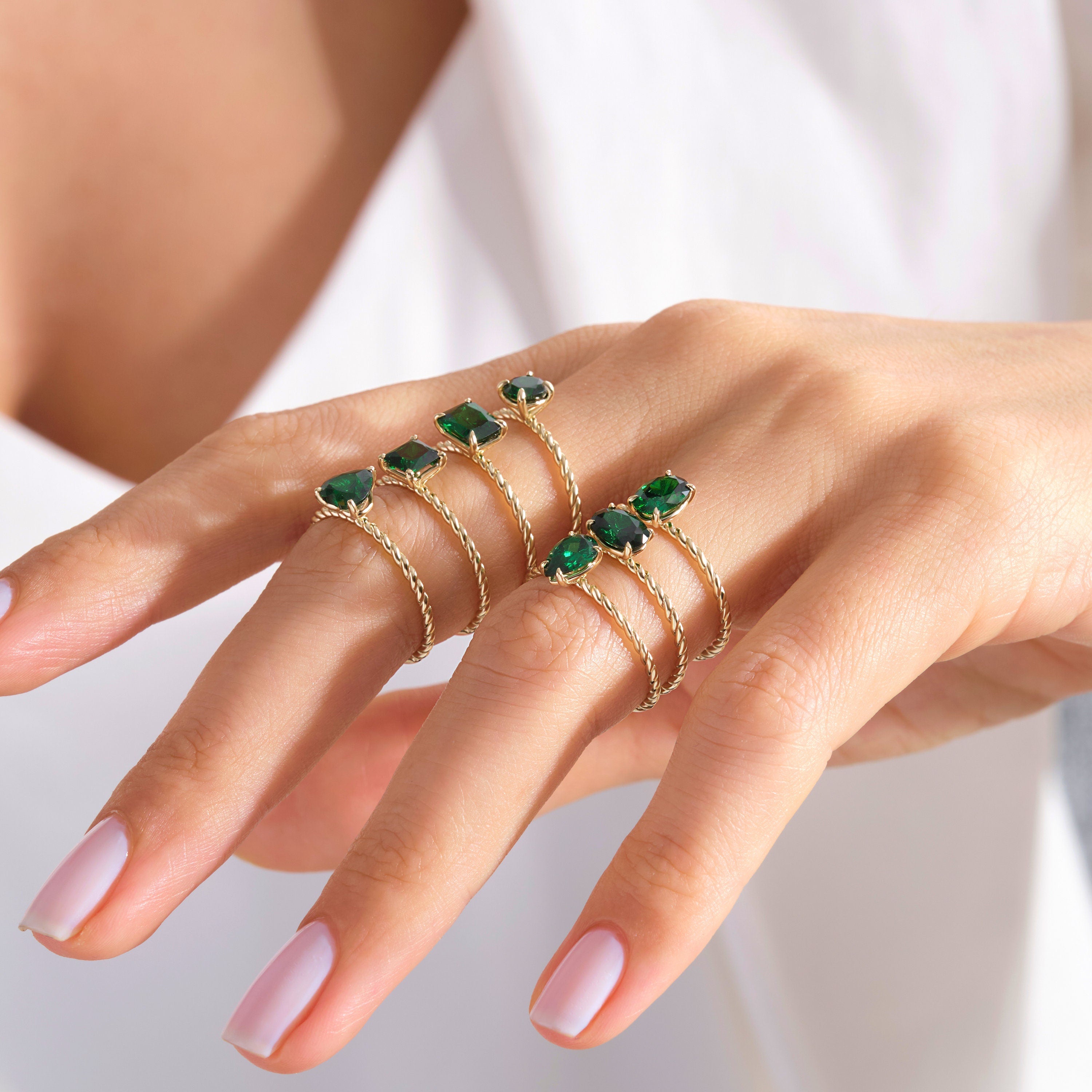 Emerald Cut Emerald Ring – 14K Solid Gold Twisted Rope Band 💚✨
This emerald cut emerald ring blends timeless sophistication with artisanal design. The deep green rectangular gemstone is beautifully framed by a twisted rope band, handcrafted in solid 14K gold for a touch of vintage luxury. Whether worn solo or stacked, it’s a graceful statement of renewal, elegance, and individuality — perfect as a birthstone, anniversary, or Christmas gift.