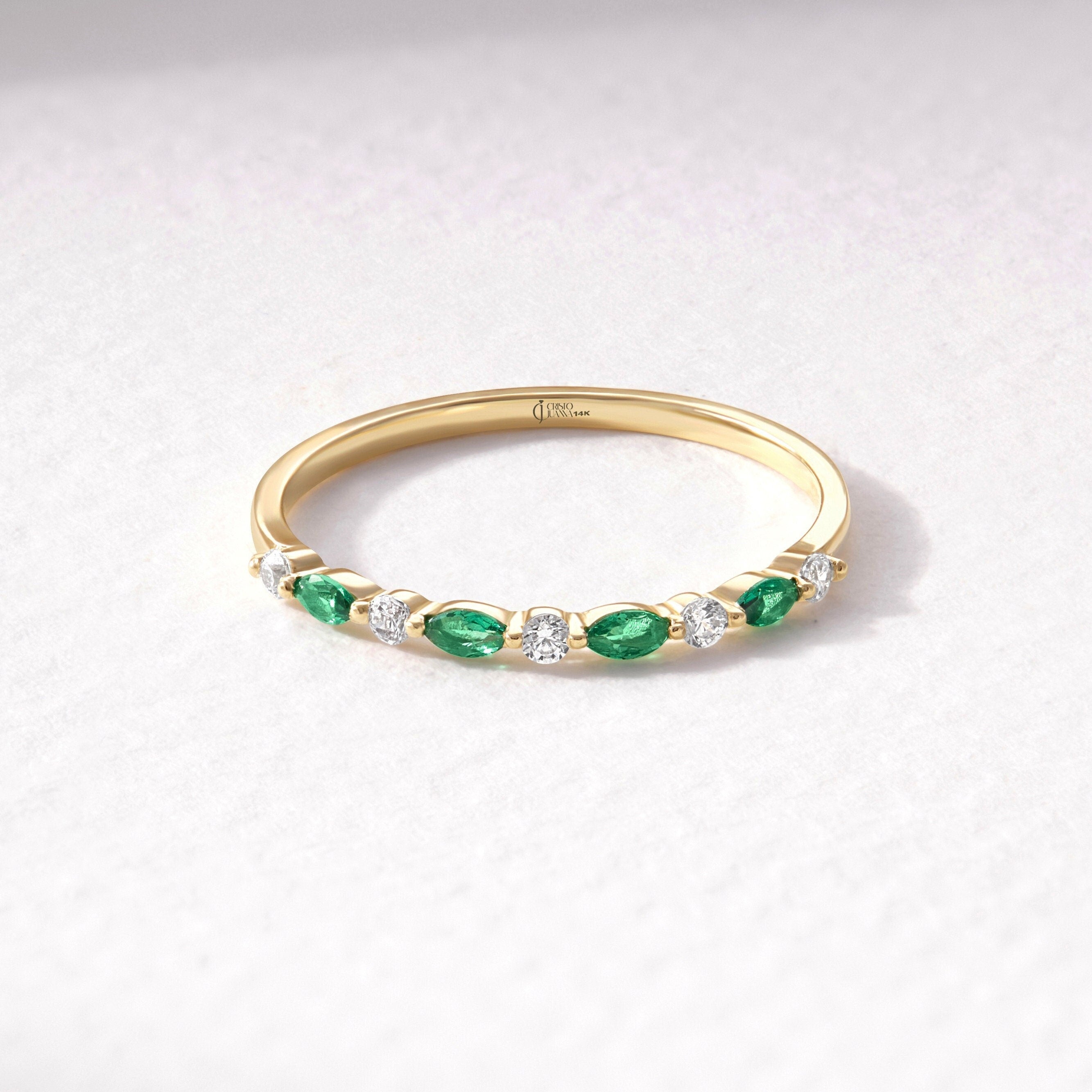💚 Marquise Emerald & Round Diamond Eternity Band – 14K Solid Gold Wedding Ring 💍

A stunning blend of elegance and symbolism, this Marquise Emerald and Round Diamond Eternity Band is crafted in solid gold and designed to shine for a lifetime. Featuring vibrant green marquise-cut stones alternating with brilliant round diamonds or moissanite, this ring offers a perfect balance of color and sparkle.

Whether worn as a wedding band, stacking ring, or anniversary gift,