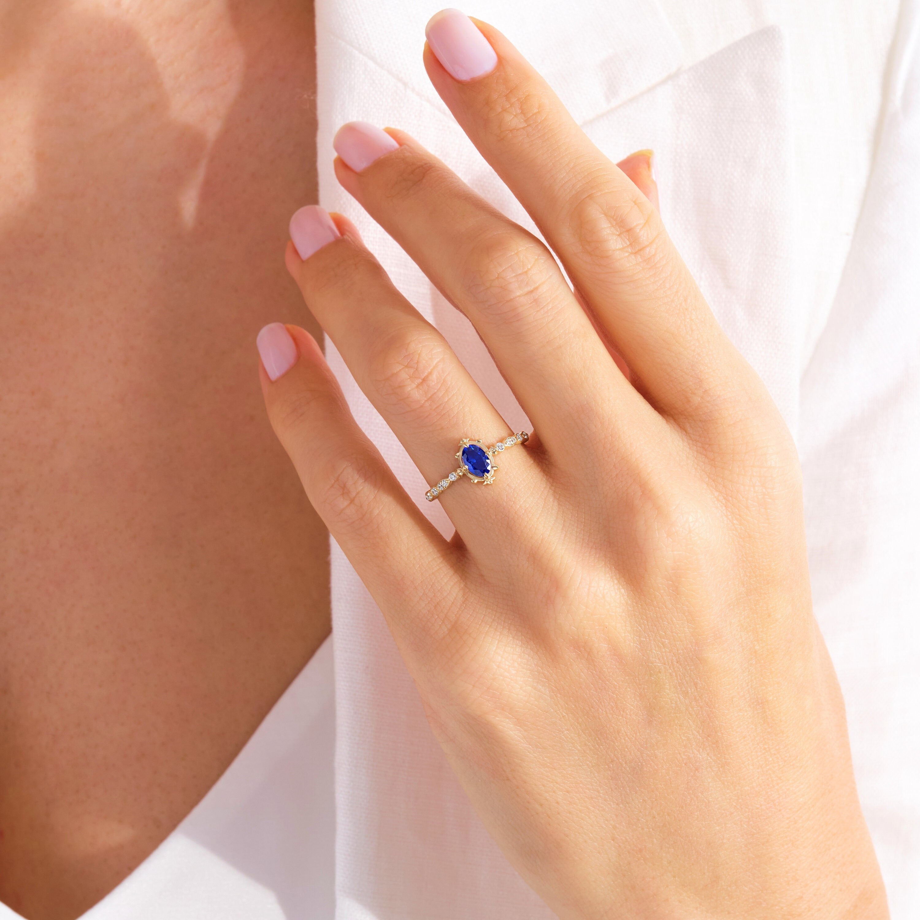 Oval Sapphire Engagement Ring – 10K / 14K / 18K Solid Gold 💙✨
This stunning oval sapphire ring sparkles with round-cut side diamonds, creating a timeless engagement or promise ring. A vintage-inspired design that combines elegance and symbolism, making it a perfect heirloom piece.