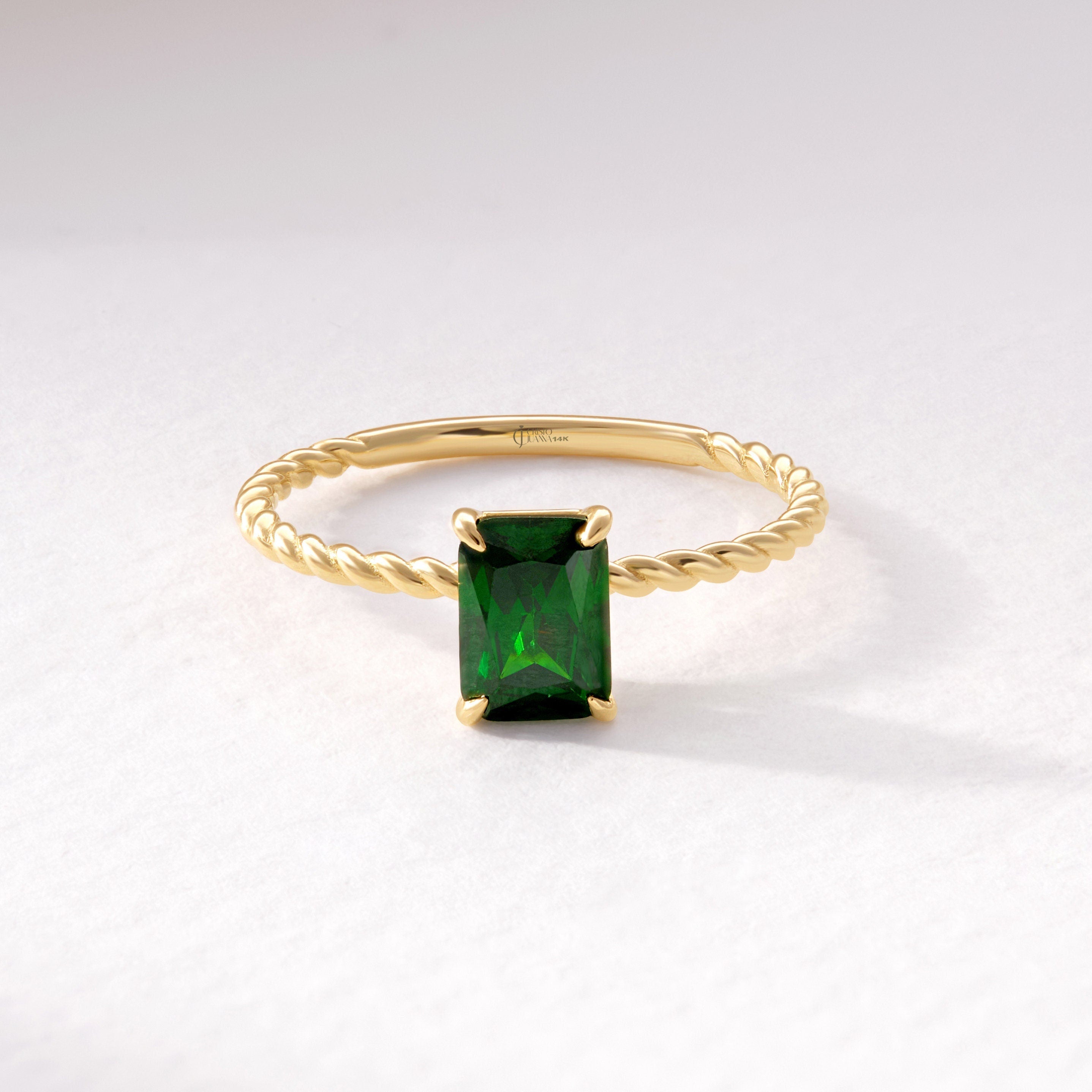 Emerald Cut Emerald Ring – 14K Solid Gold Twisted Rope Band 💚✨
This emerald cut emerald ring blends timeless sophistication with artisanal design. The deep green rectangular gemstone is beautifully framed by a twisted rope band, handcrafted in solid 14K gold for a touch of vintage luxury. Whether worn solo or stacked, it’s a graceful statement of renewal, elegance, and individuality — perfect as a birthstone, anniversary, or Christmas gift.