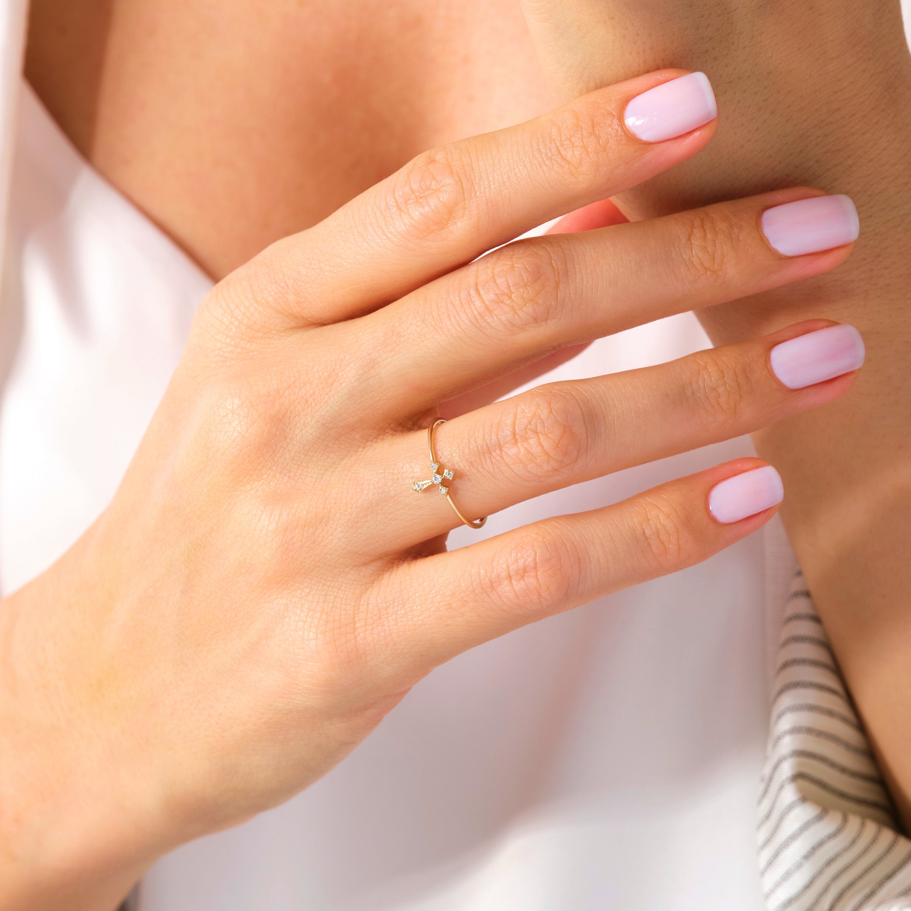 14K Solid Gold Cross Diamond Ring – Stackable Religious Rosary Band ✝️💎
Graceful and symbolic, this cross diamond ring blends faith and elegance in a sleek, minimalist design. Perfect for daily wear or stacking, it’s a meaningful piece that honors spirituality and timeless style. Whether you wear it as a Christian ring for women, a baptism gift, or a simple religious 10K ring, this piece will always carry deep significance.