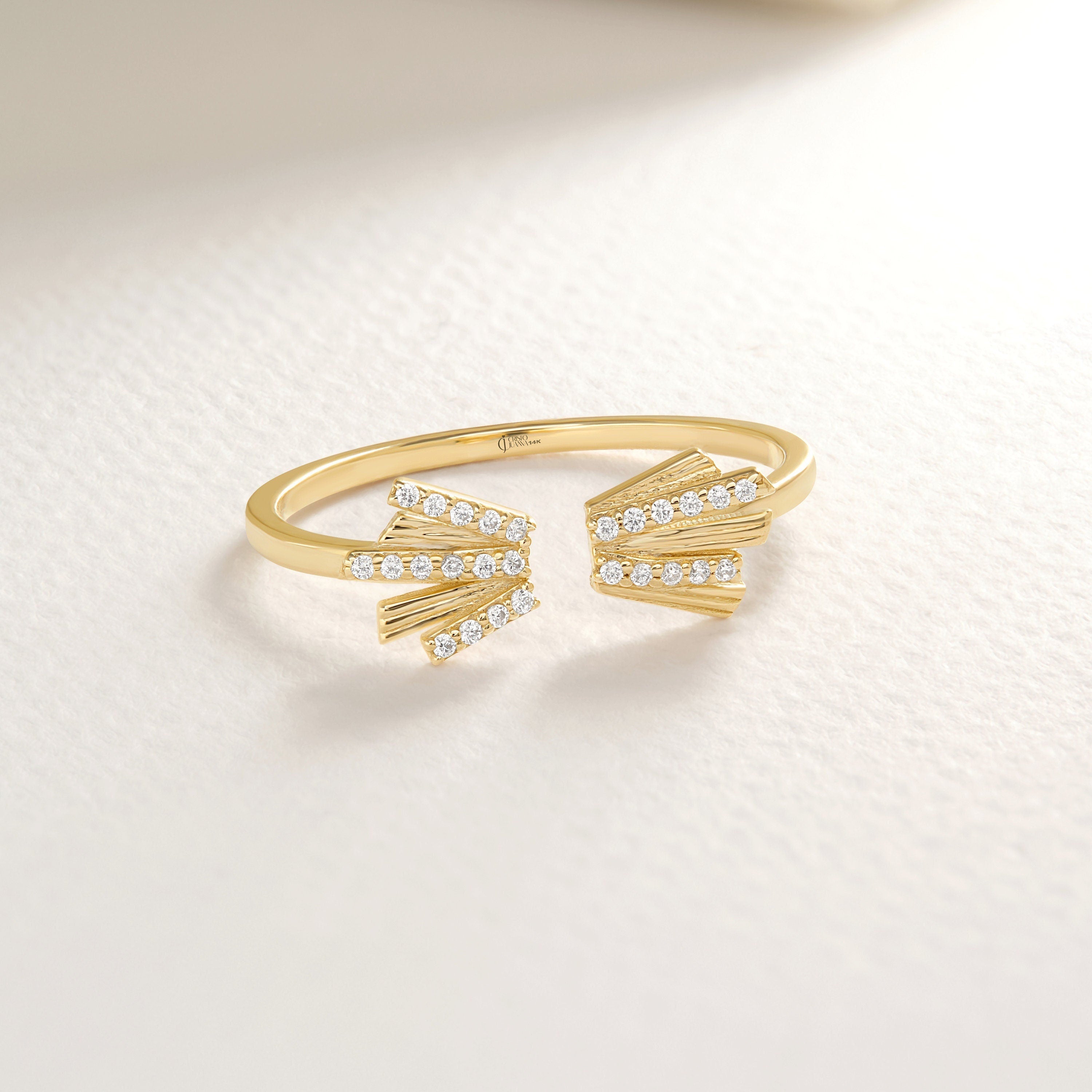 Here's the scatter diamond ring 14K solid gold open W shape band by Christo! Our thin diamond stackable ring gold is perfect open adjustable ring for Girls. Are you looking for open stackable ring and V shape diamond ring, here is the V diamond ring gold and thin diamond ring. Discover our Chevron stacking 14K and small diamond ring.