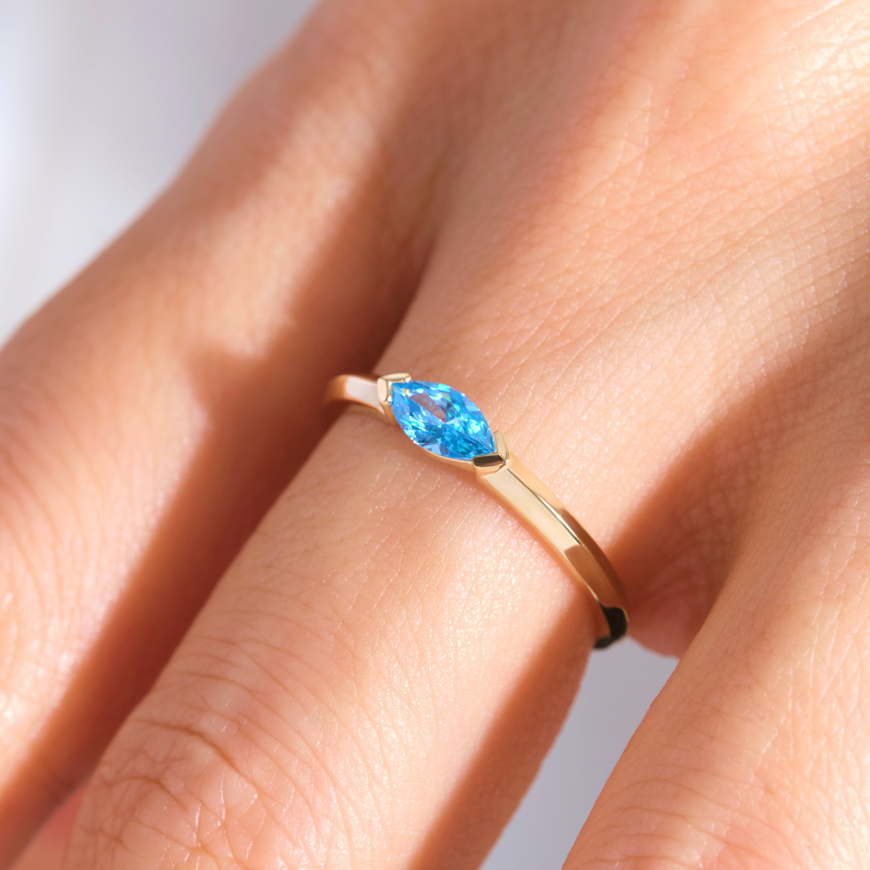 Here is Marquise Blue Topaz Ring for Women! This Pretty Custom Birthstone Ring will be perfect matches as a other blue person gift 14K. With 10K 14K 18K Gold Blue Gemstone Ring is best balance of minimalism.