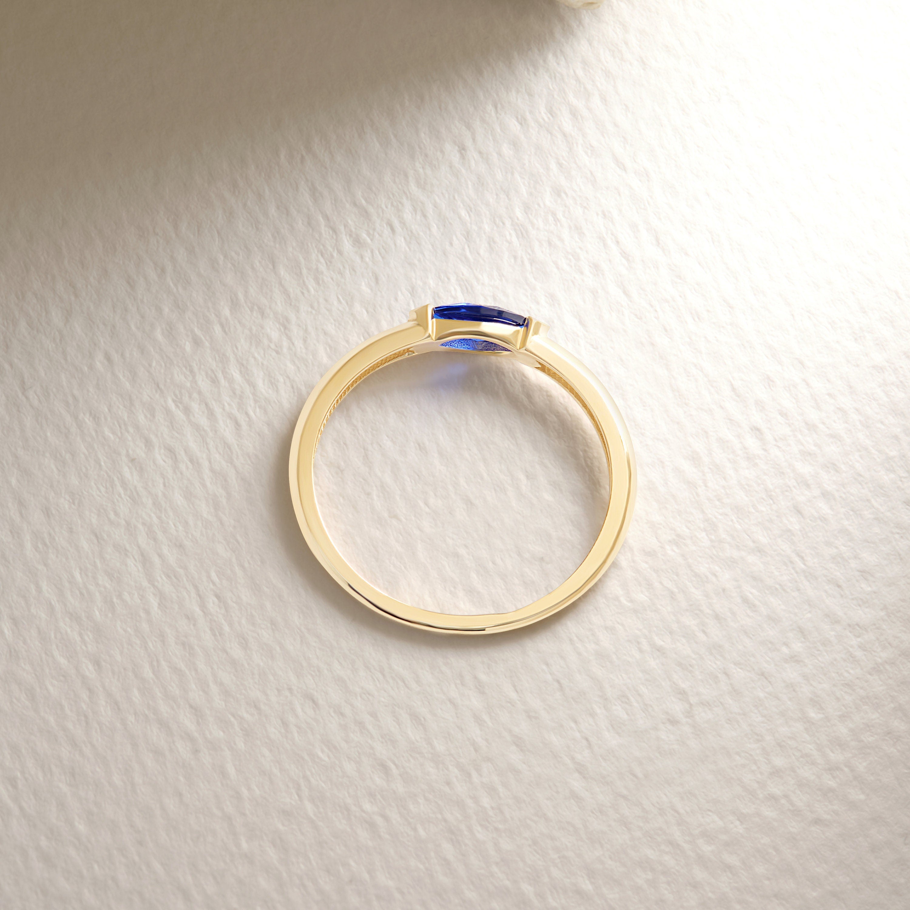 Here is marquise sapphire ring 10K 14K 18K solid gold! This blue sapphire marquise cut birthstone ring will be perfect gift for women.This customizable blue horizontal set ring can be switch with her birthstone. If you re looking for september birthstone and marquise birth stone ring, here is the horizontal set ring and everyday wear ring. Discover our marquise cut stone ring and blue gemstone ring as a gifted ring for her.