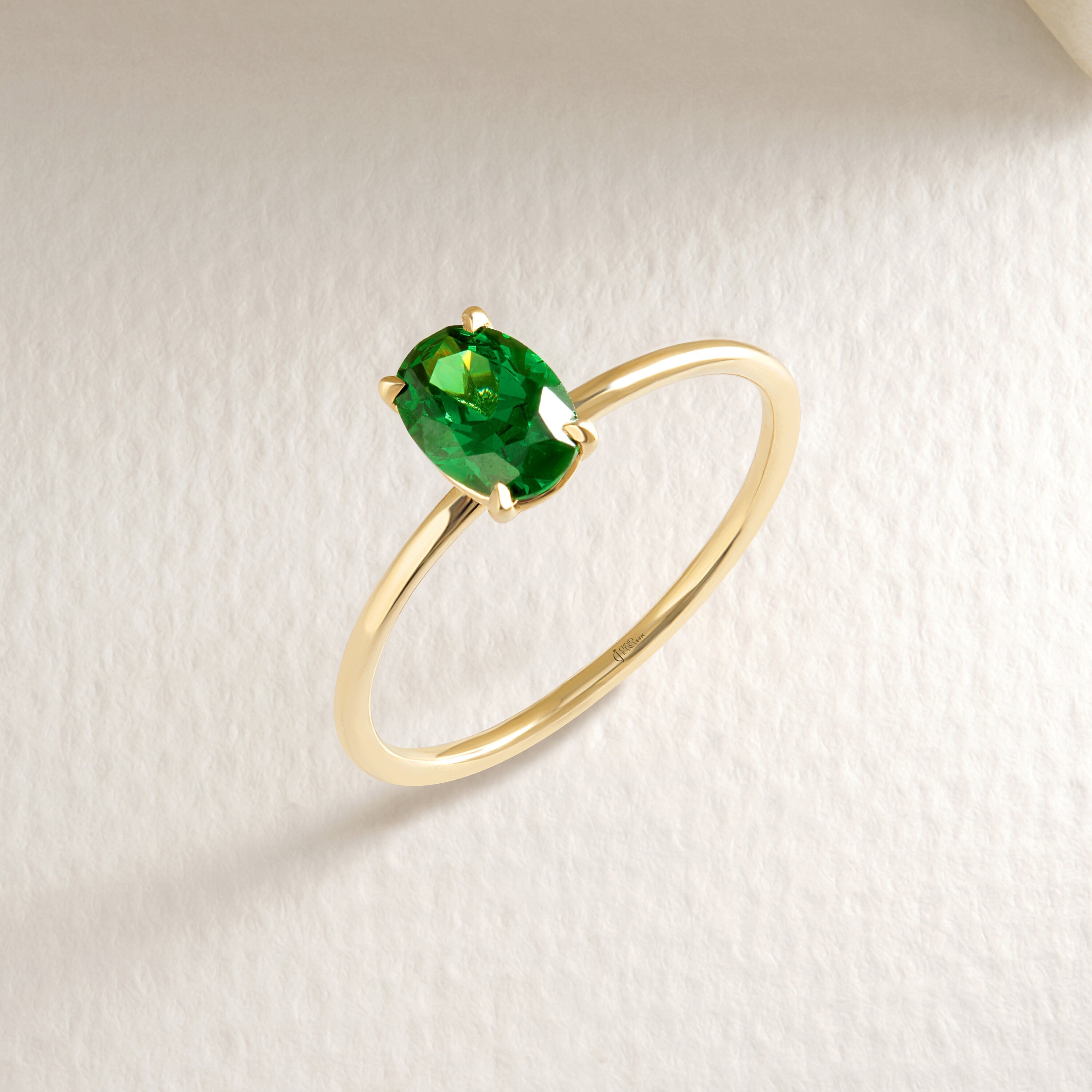 💍 Oval Emerald Birthstone Ring — 14K Solid Gold Solitaire Green Gemstone Band

This elegant oval emerald ring brings a rich, vibrant pop of green to any jewelry collection. Crafted in solid gold with a smooth, dainty band, it’s perfect as a birthstone ring, everyday solitaire, or meaningful gift for someone special. Its minimalist silhouette makes it ideal for stacking or wearing alone as a timeless statement piece.