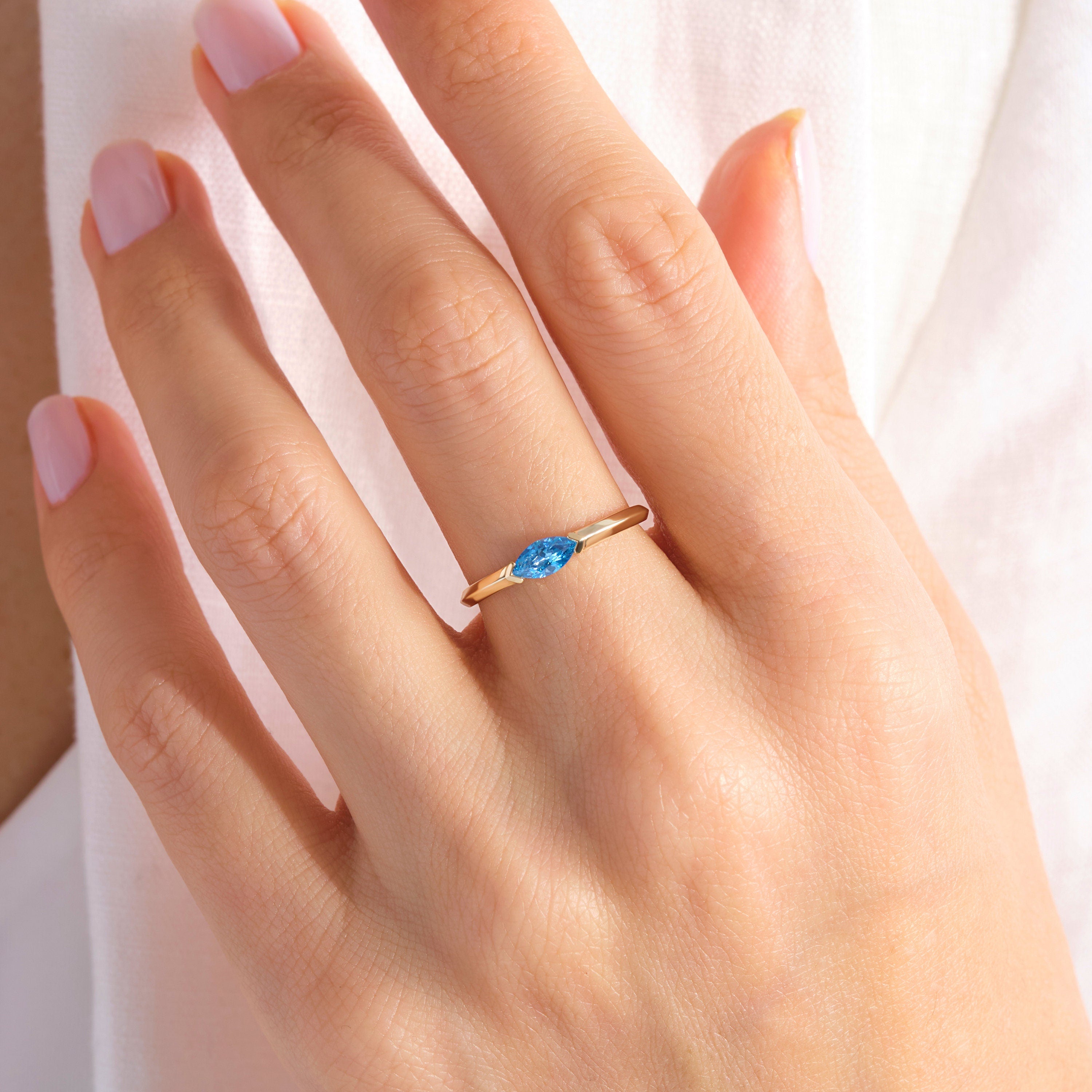 Here is Marquise Blue Topaz Ring for Women! This Pretty Custom Birthstone Ring will be perfect matches as a other blue person gift 14K. With 10K 14K 18K Gold Blue Gemstone Ring is best balance of minimalism.