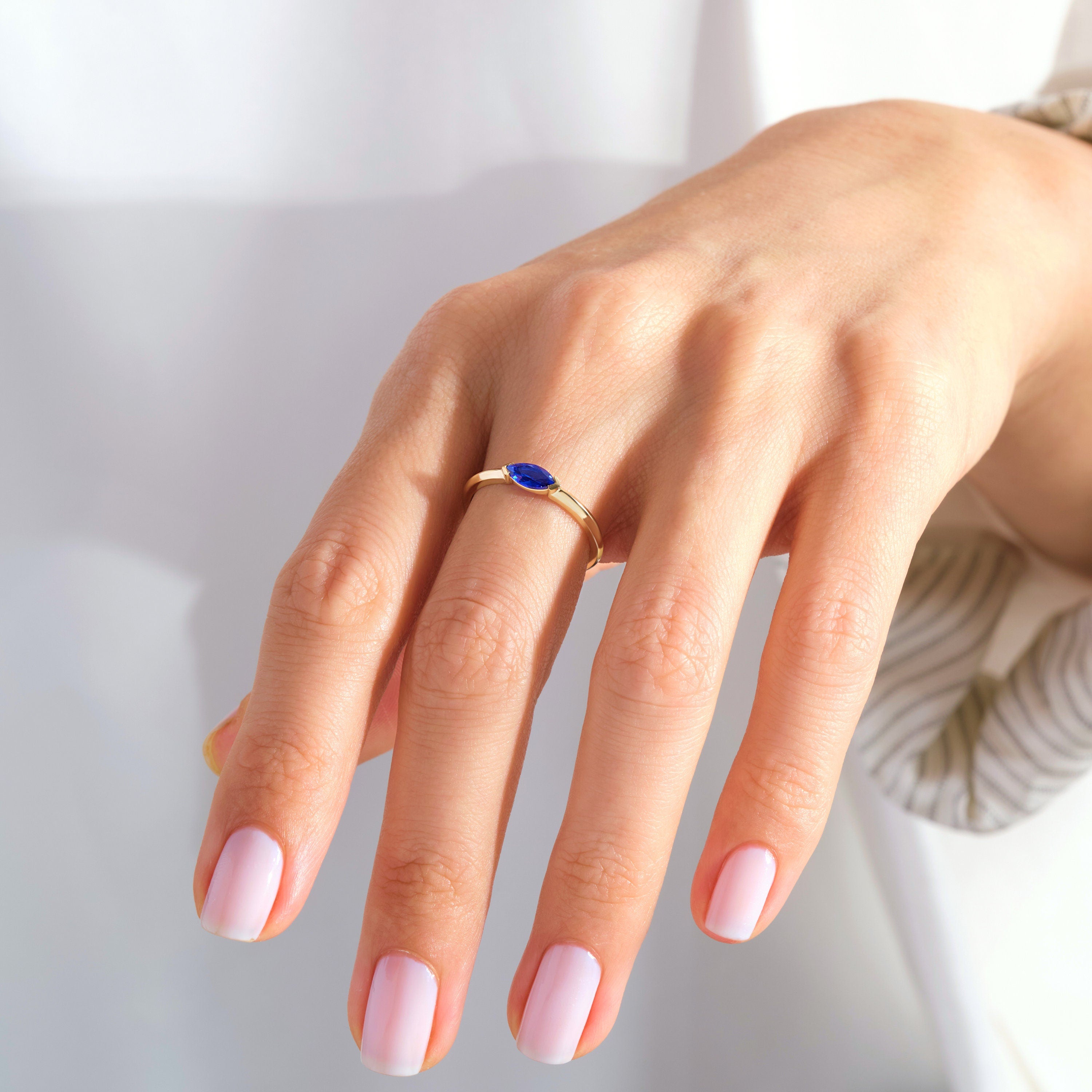 Marquise Sapphire Ring – 10K / 14K / 18K Solid Gold ✨💙
Elegant and timeless, this marquise cut sapphire ring makes the perfect September birthstone jewelry. Its dainty, stackable design is ideal for everyday wear and also a meaningful gift for someone special.