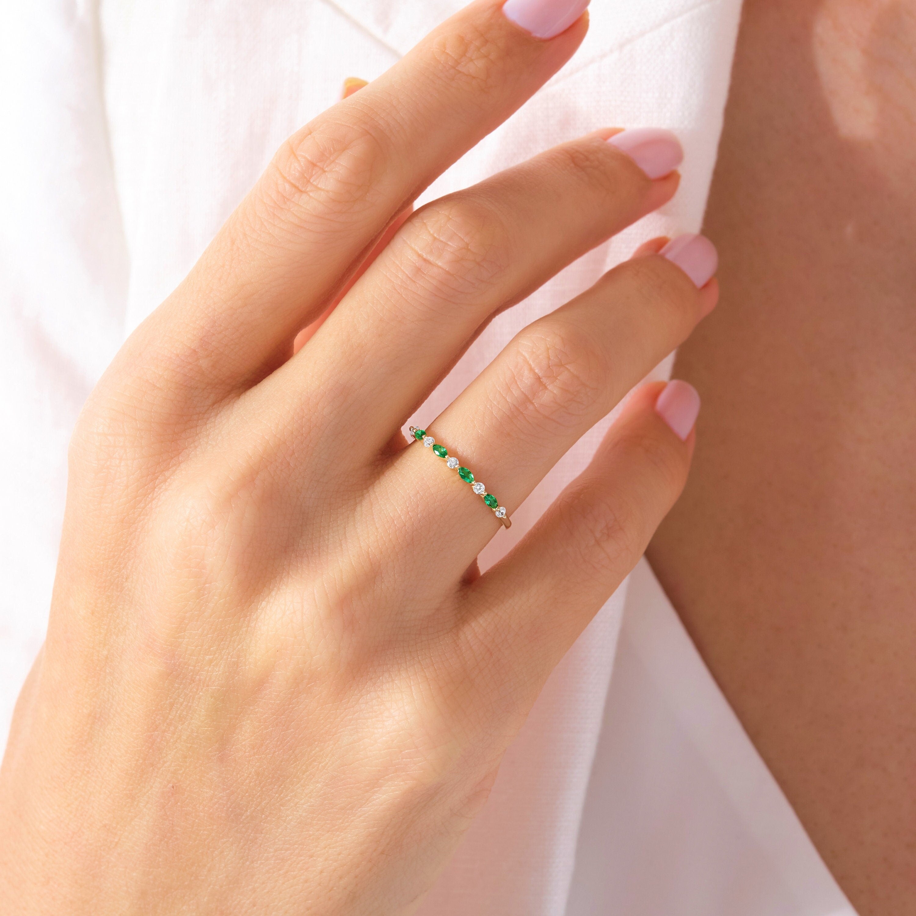 💚 Marquise Emerald & Round Diamond Eternity Band – 14K Solid Gold Wedding Ring 💍

A stunning blend of elegance and symbolism, this Marquise Emerald and Round Diamond Eternity Band is crafted in solid gold and designed to shine for a lifetime. Featuring vibrant green marquise-cut stones alternating with brilliant round diamonds or moissanite, this ring offers a perfect balance of color and sparkle.

Whether worn as a wedding band, stacking ring, or anniversary gift,