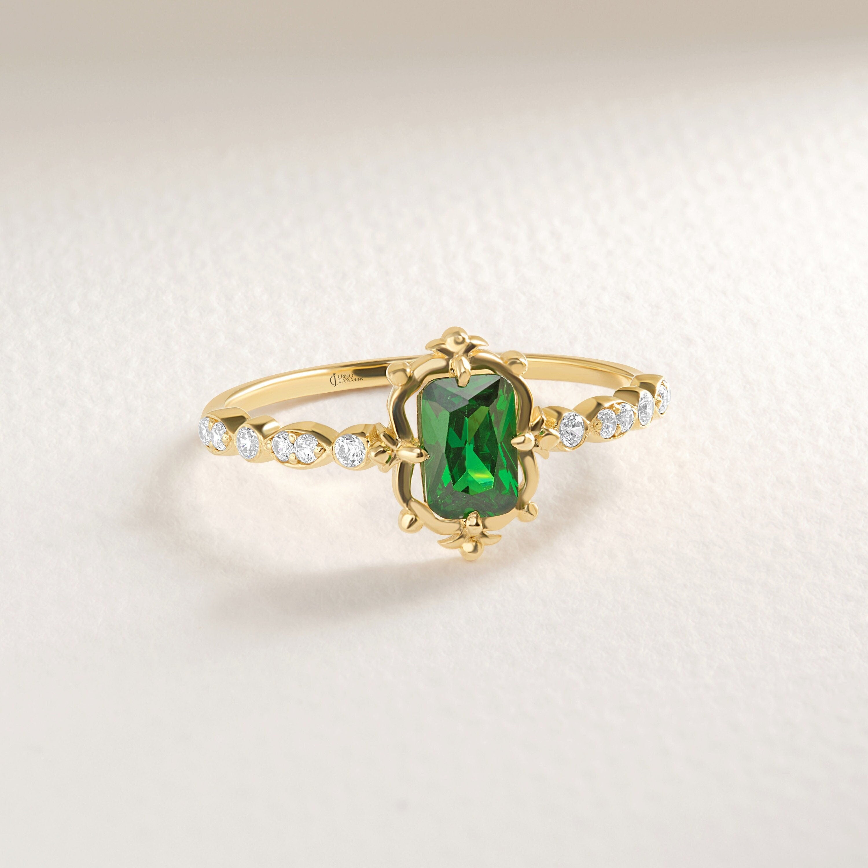 Emerald Cut Emerald Engagement Ring – 14K Solid Gold Rectangle Birthstone Ring 💚✨
Elegant, timeless, and handcrafted to perfection — this Emerald Cut Emerald Engagement Ring brings refined luxury to every moment. Set with a vibrant 6x4 mm emerald and surrounded by delicate side diamonds, it captures both strength and serenity in its design.