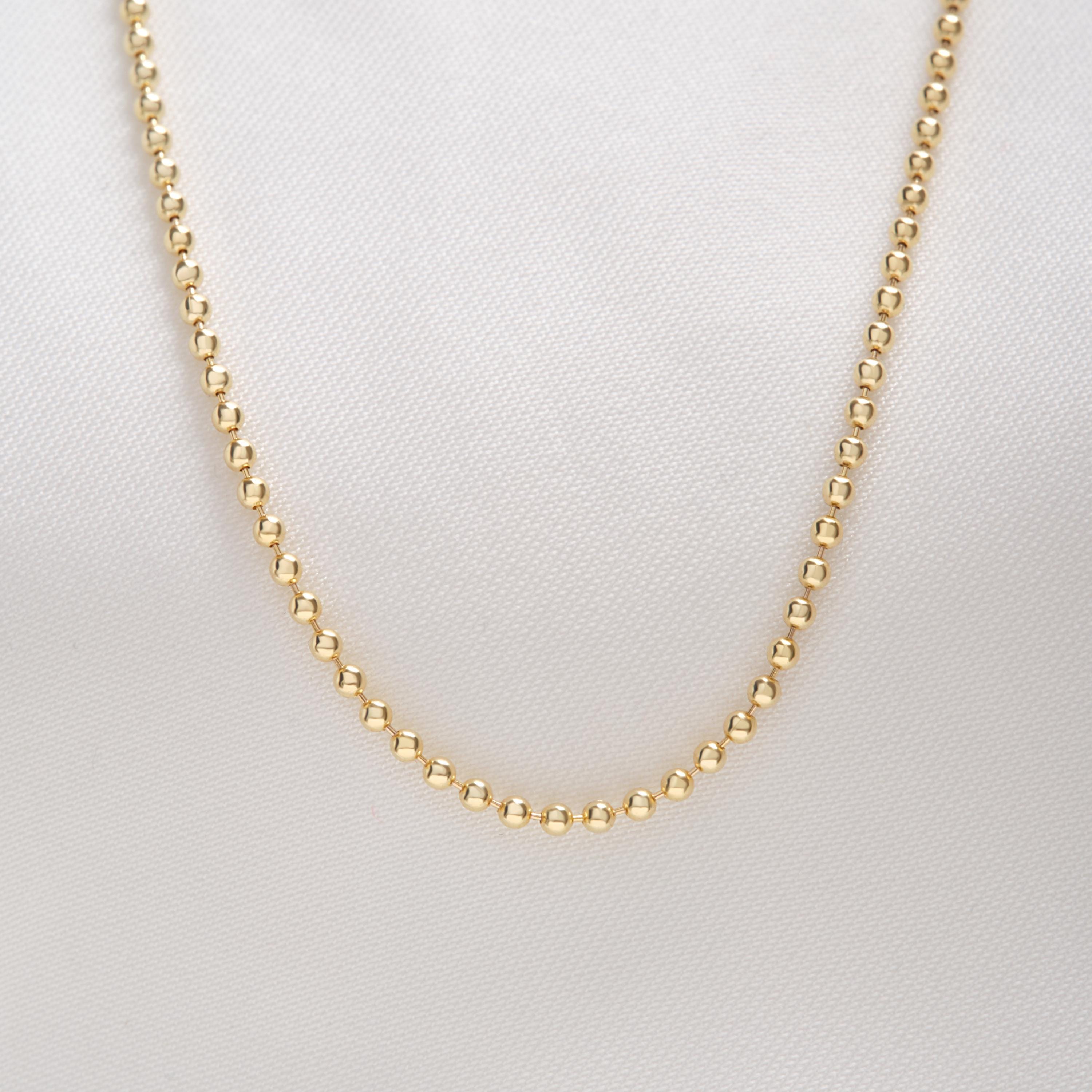 Bead Chain Necklace – 14K Solid Gold ✨💛
A timeless beaded chain designed for everyday elegance. This 1.5 mm solid gold bead necklace is perfect for layering with other chains or wearing alone for a minimalist, chic look.